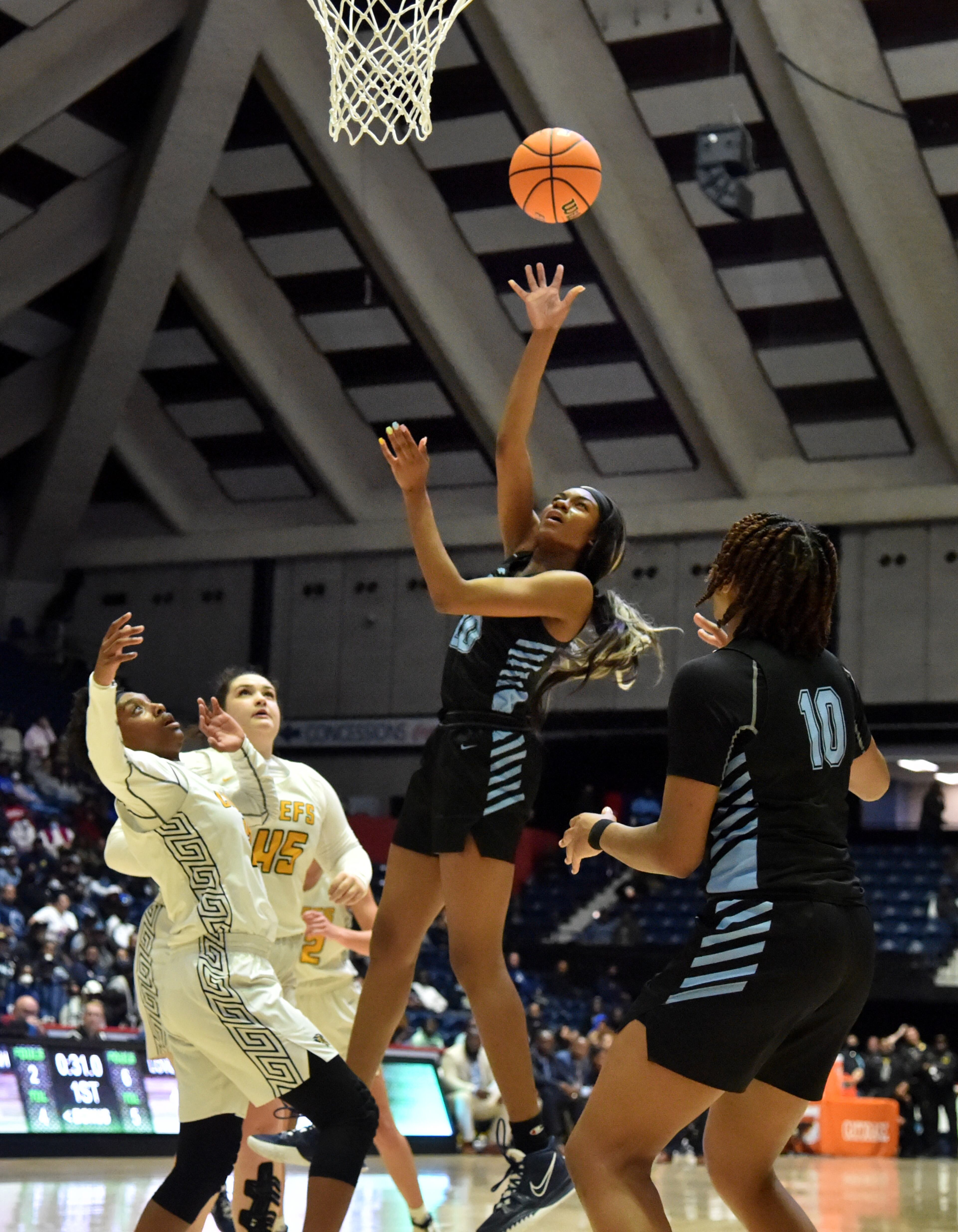 March 11, 2022 Macon - Lovejoy's Bryana Hardy (20) goes up for the shot during the 2022 GHSA State Basketball Class AAAAAA Girls Championship game at the Macon Centreplex in Macon on Friday, March 11, 2022. (Hyosub Shin / Hyosub.Shin@ajc.com)