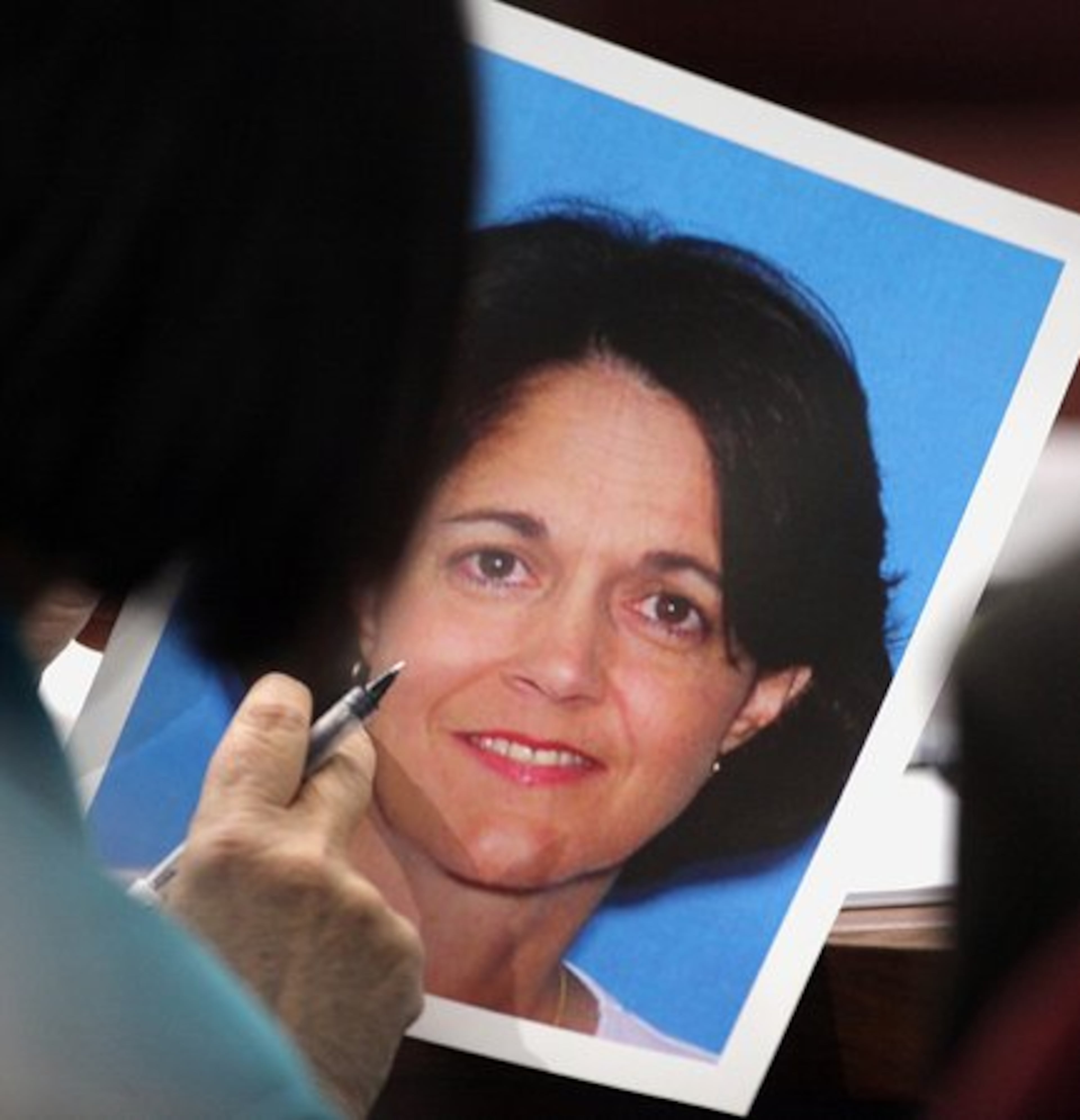 A portrait of Cheryl Dunlap is shown before being admitted into evidence in courtroom 3A on Friday, Feb. 4, 2011. Gary Michael Hilton was convicted Feb. 15 in her murder.