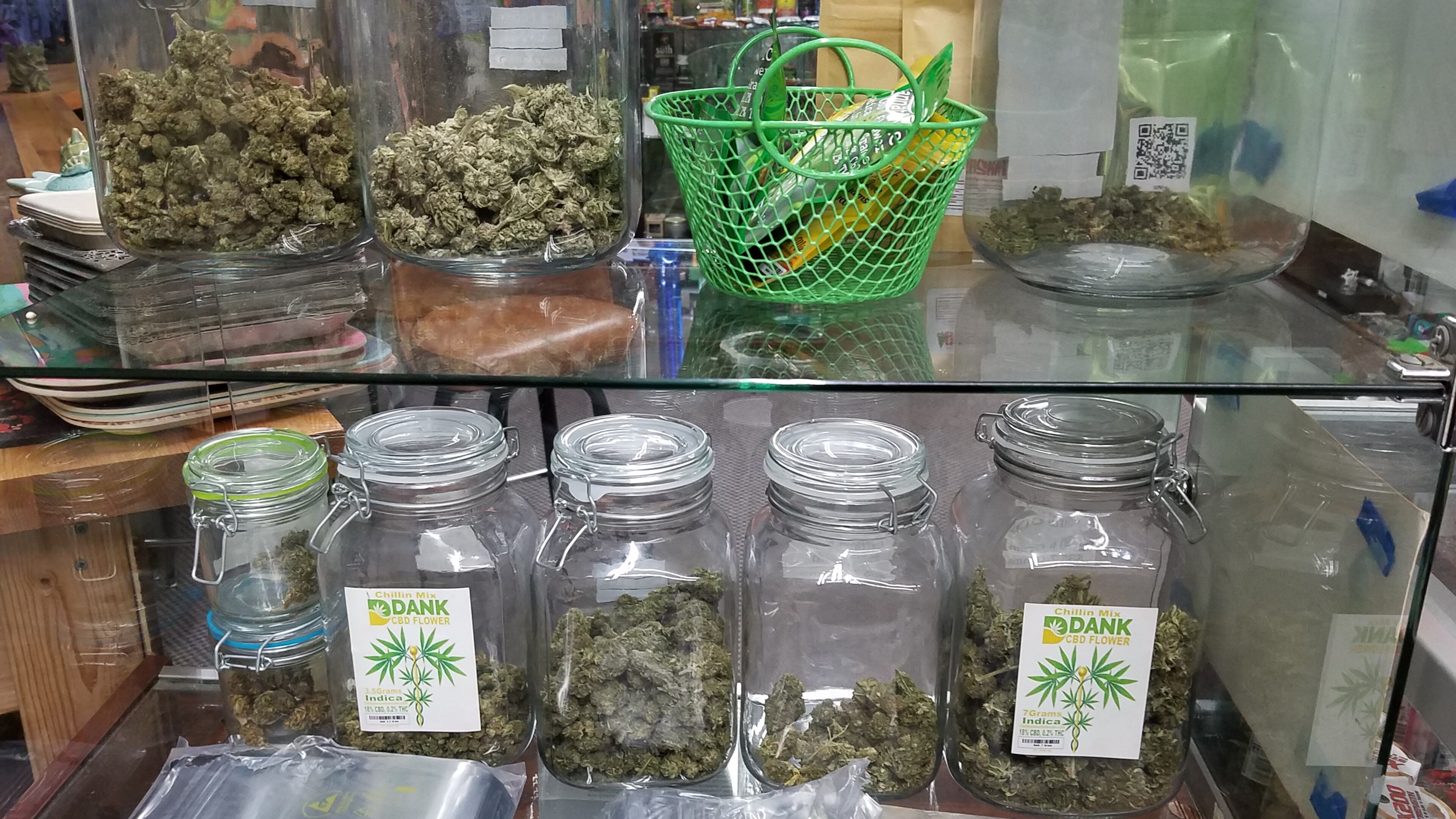 Marietta police raided two businesses and seized more than 100 pounds in suspected drugs Tuesday.