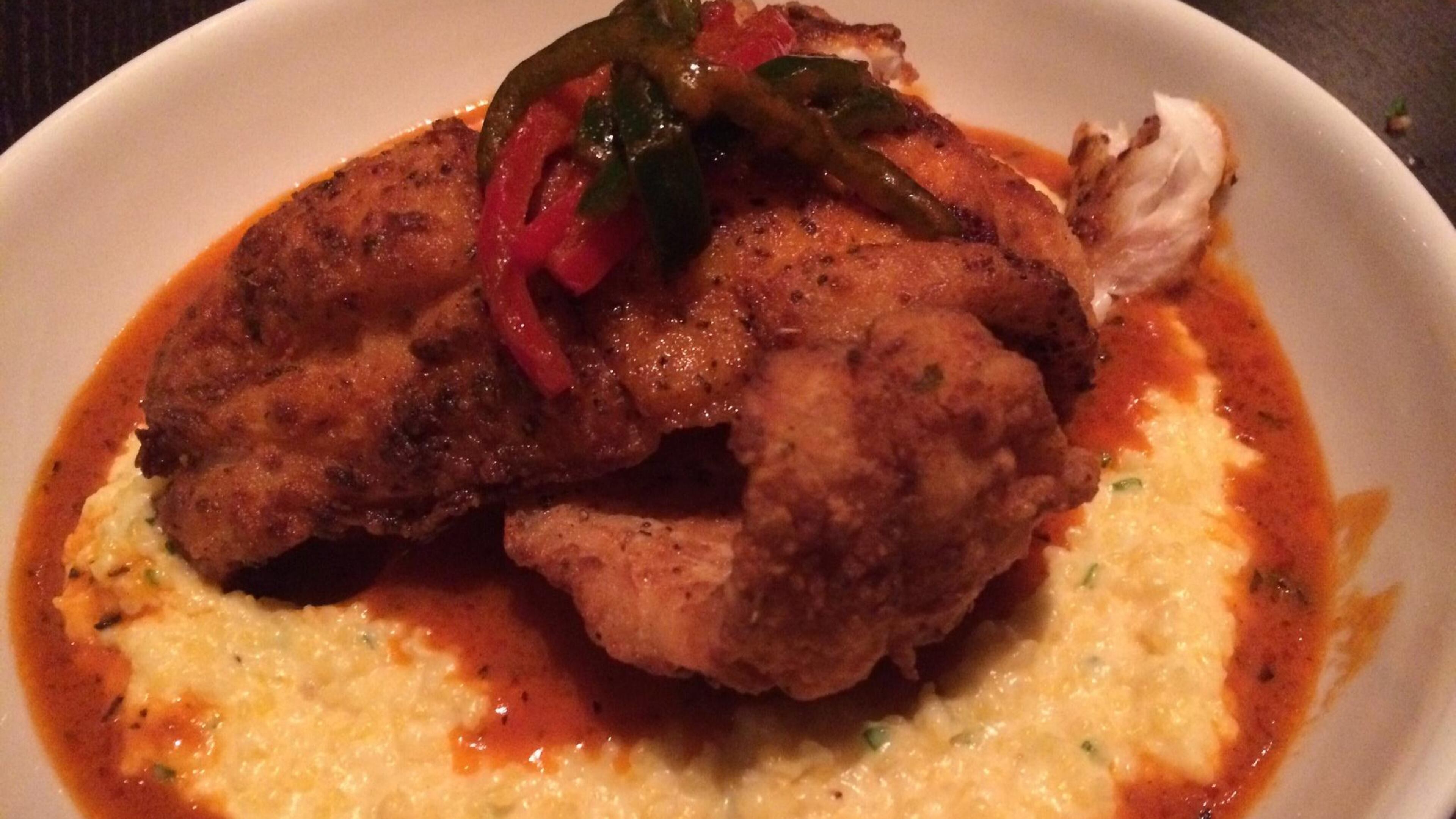 Grouper & Grits at Simon’s Restaurant is a rich mess of fish in a puddle of rich cheesy grits. CONTRIBUTED BY WENDELL BROCK