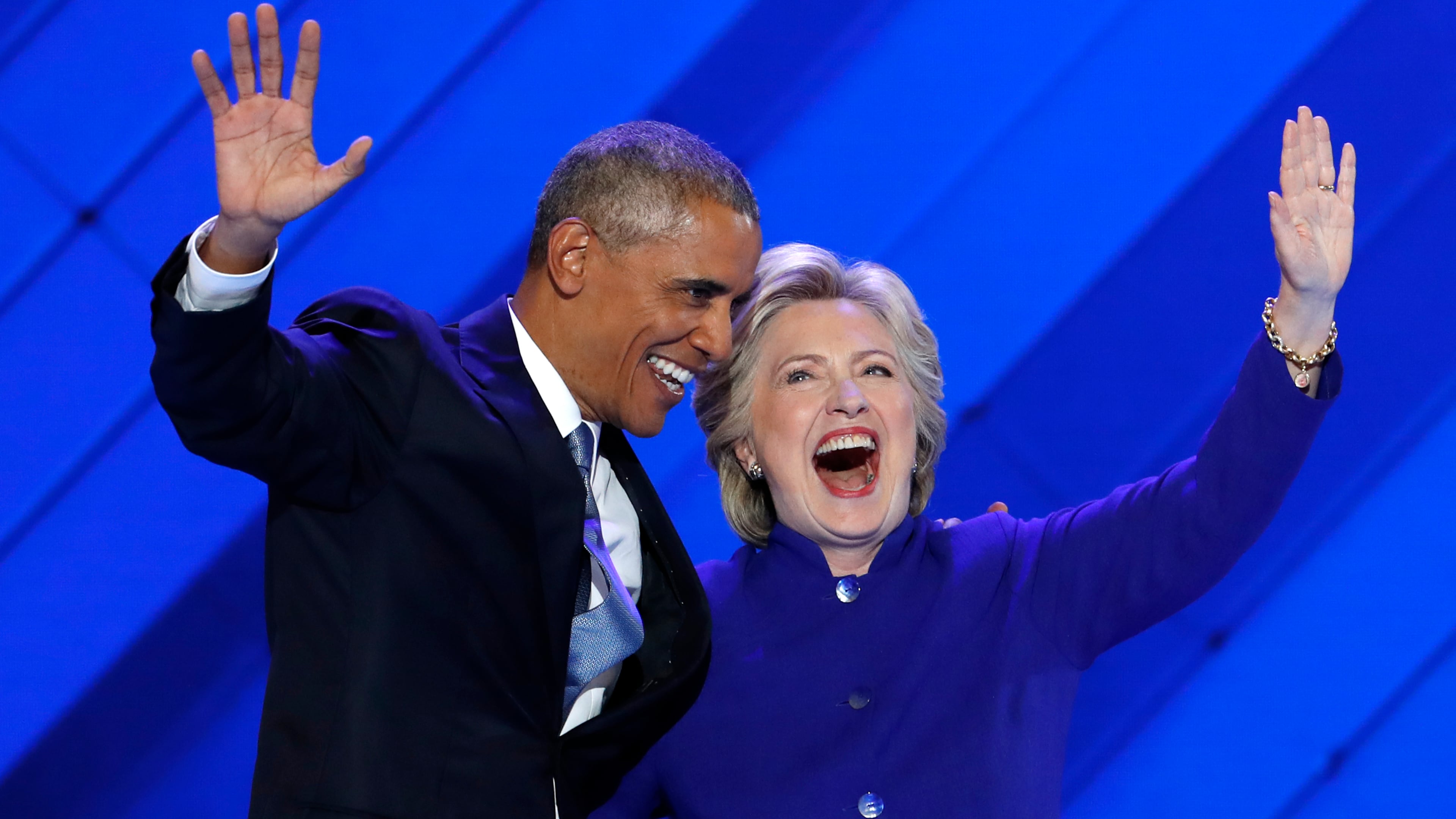 President Barack Obama and Democratic Presidential nominee Hillary Clinton wave to delegates after President Obama's speech during the third day of the Democratic National Convention in Philadelphia, Wednesday, July 27, 2016. (AP Photo/J. Scott Applewhite)