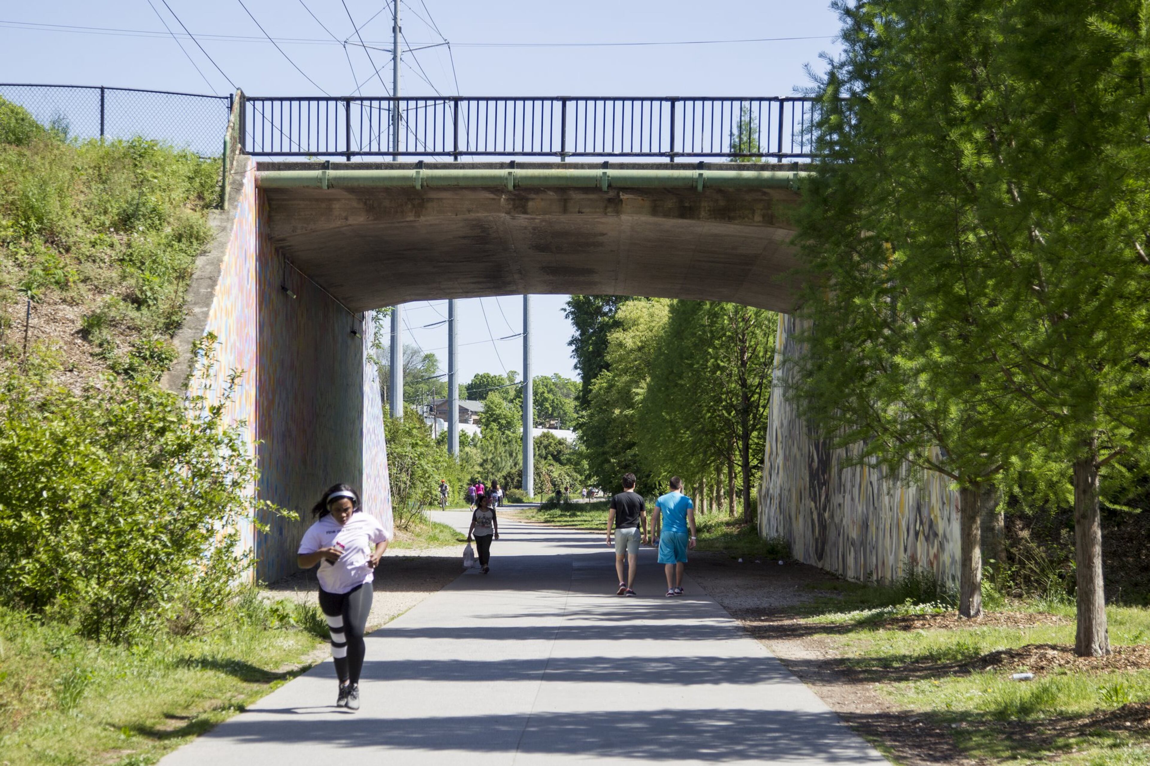 People walk the Eastside Beltline trail in Atlanta. Walking even 10 minutes a day can be life-changing. (REANN HUBER/REANN.HUBER@AJC.COM)