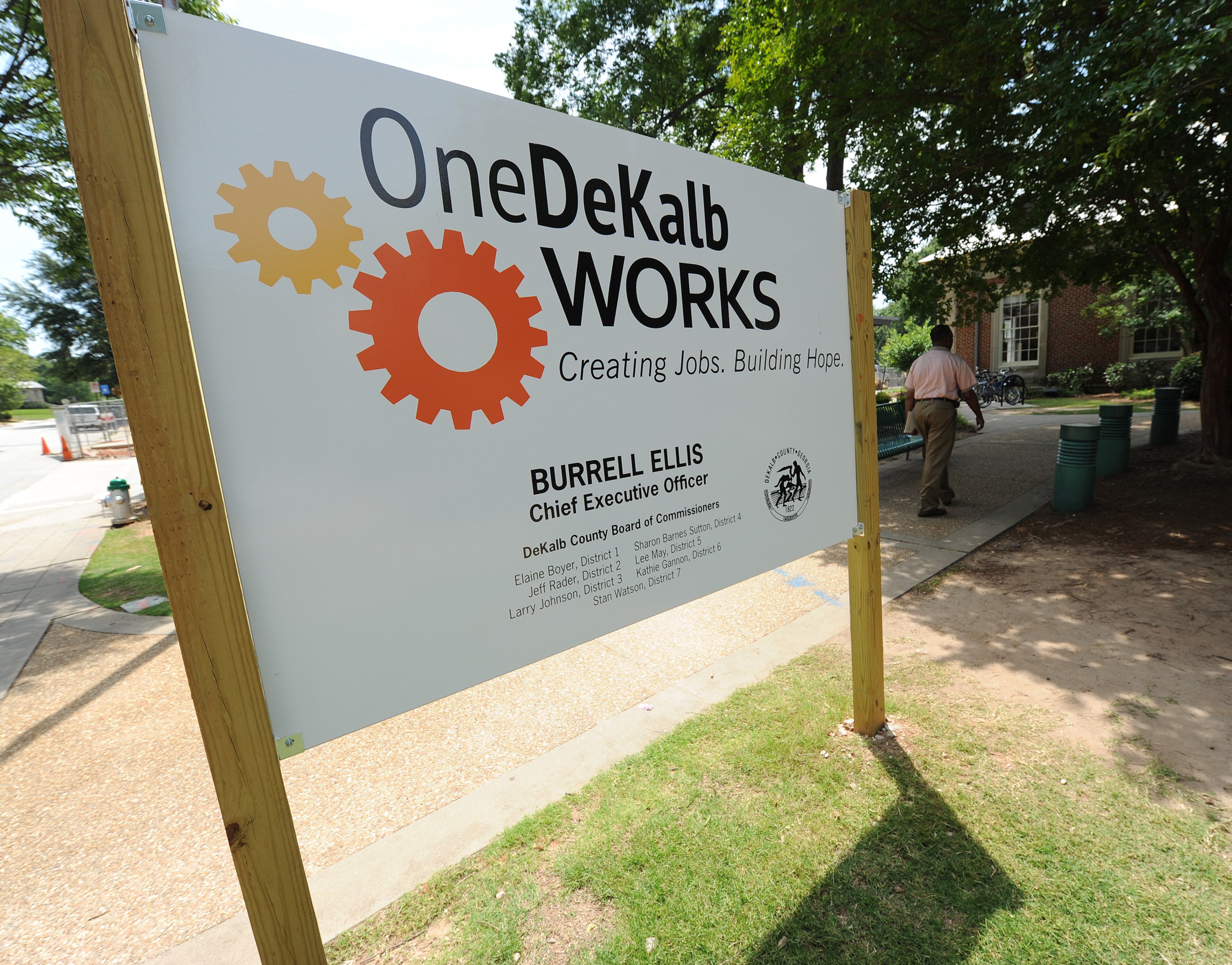 This OneDeKalb Works sign in front of the Decatur Library displays DeKalb County CEO Burrell Ellis name in bold letters and the other commissioners in small print on Thursday, May 31, 2012. DeKalb could potentially spend $40,000 on signs around the county that announce various government projects, such as putting a new roof on the Decatur library or moving dirt for a sewer plant expansion. This is on top of the several thousand the county typically spends every election cycle, to get government officials name on its more permanent signs in front of government building. JOHNNY CRAWFORD / JCRAWFORD@AJC.COM