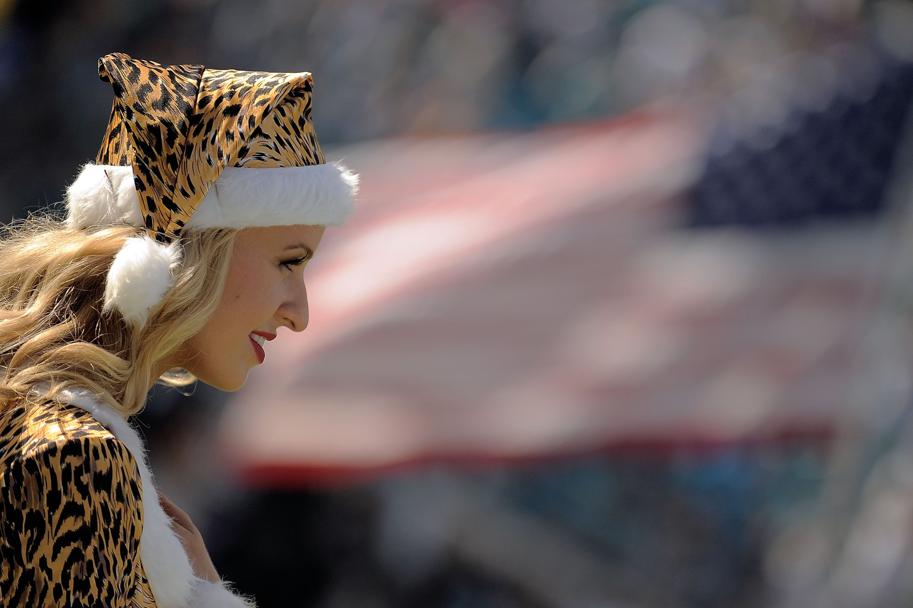 Cheerleader for the Jacksonville Jaguars stands for the national anthem prior to a game against the Tennessee Titans at EverBank Field in Jacksonville, Fla. Tennessee won the game 20-16. (Photo by Stacy Revere/Getty Images)