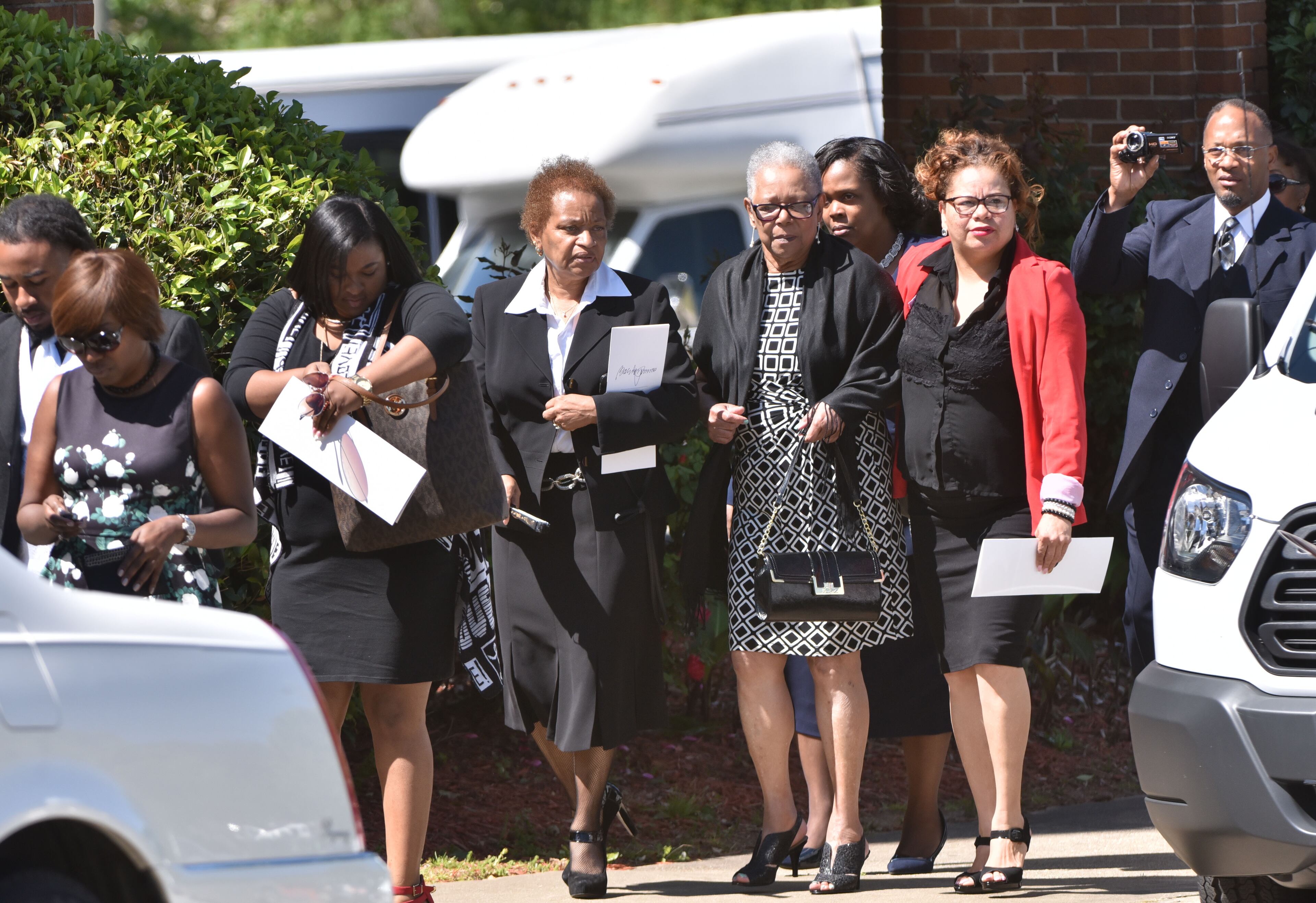 Mourners arrive at Antioch Baptist Church North for the funeral service of community leader Barney Simms on Saturday, April 16, 2016. HYOSUB SHIN / HSHIN@AJC.COM