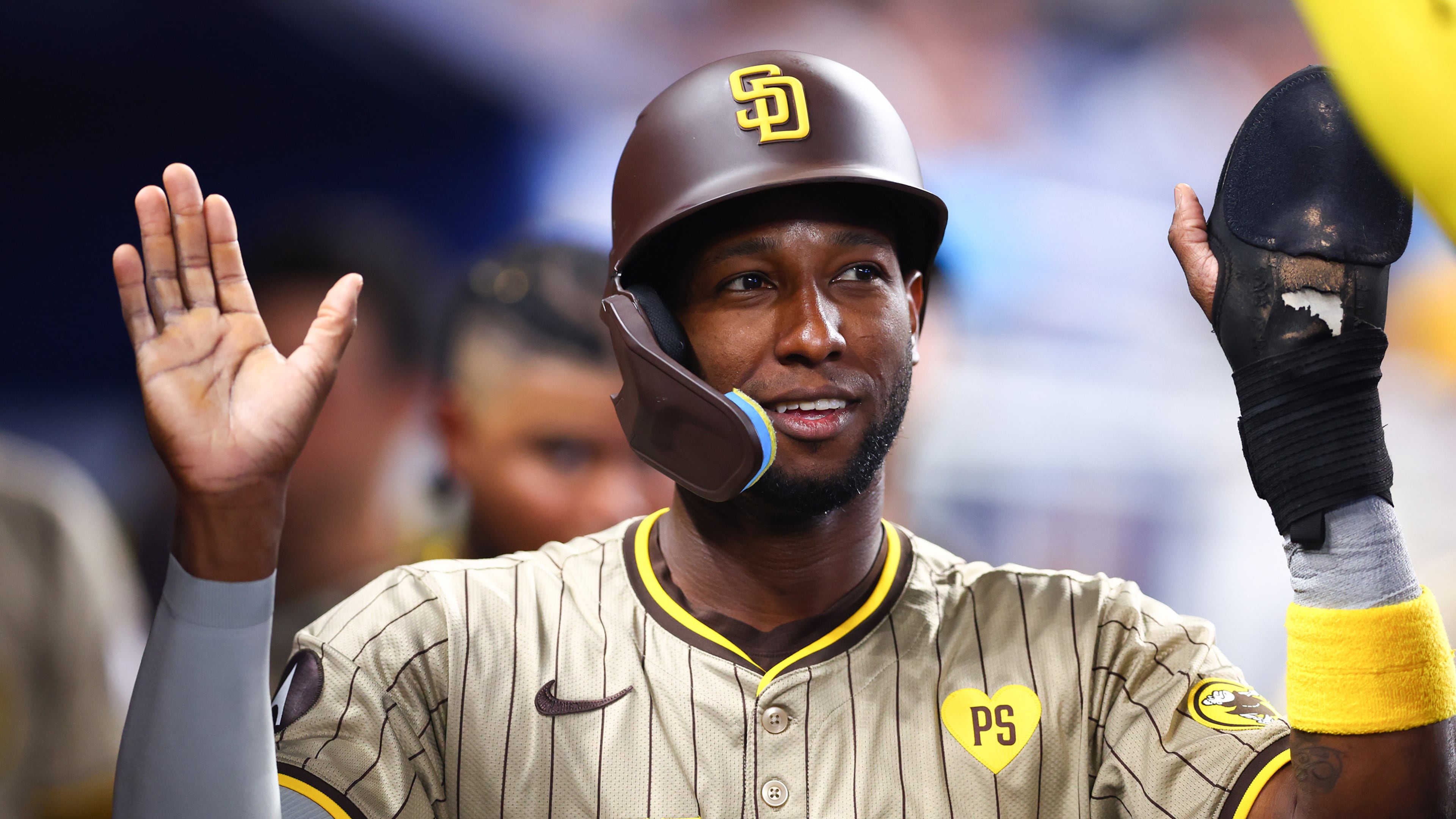 Jurickson Profar of the San Diego Padres celebrates with teammates after scoring a run against the Miami Marlins during the third inning at loanDepot park on Saturday, Aug. 10, 2024, in Miami. (Megan Briggs/Getty Images/TNS)