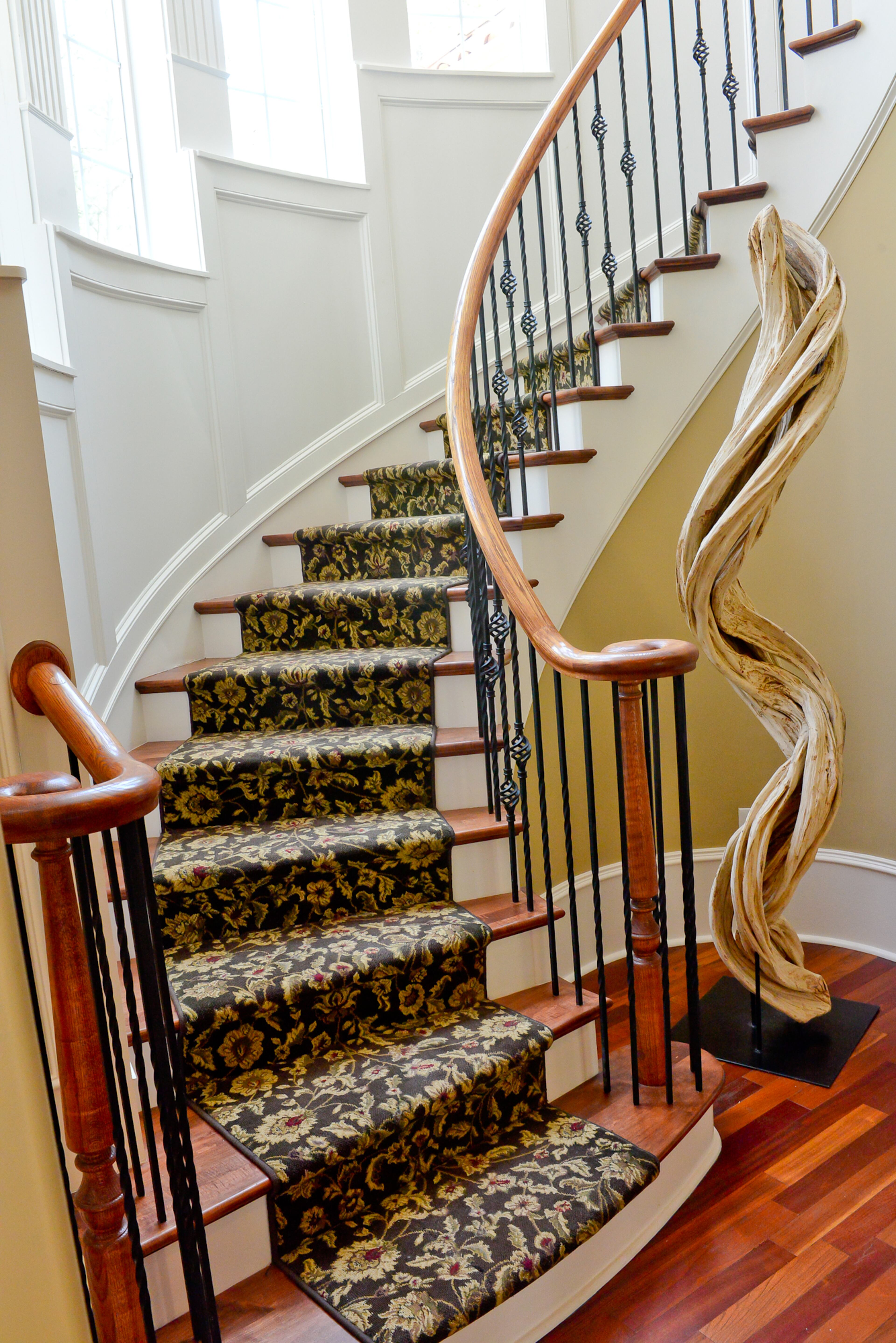 Jeffrey Bulvin loved the beautiful spiral staircase leading upstairs in his Vinings home so much that he created a similar staircase going downstairs when he finished the basement.