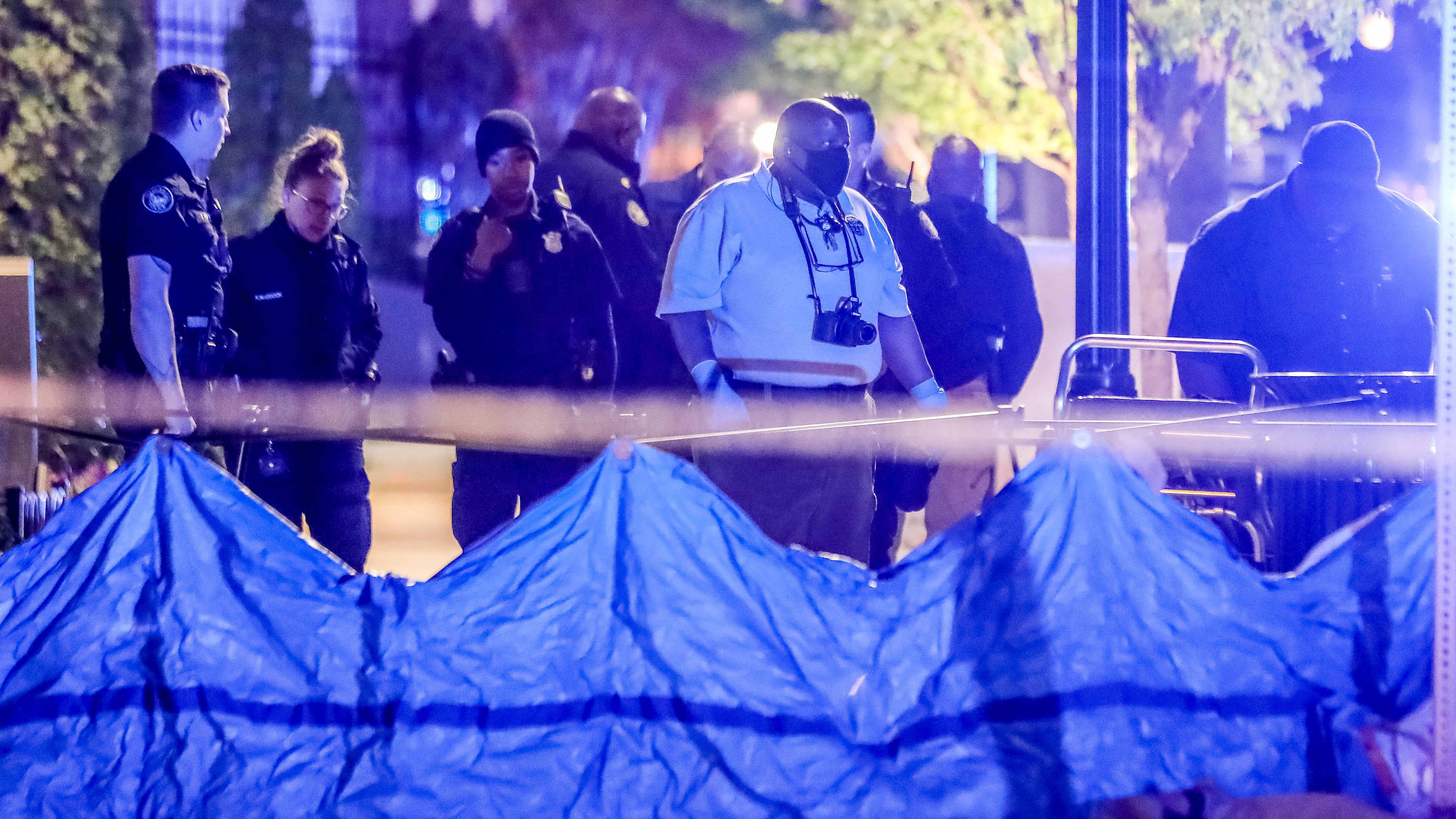 A shooting Monday morning left a man dead on the sidewalk outside a luxury apartment building in Midtown Atlanta.