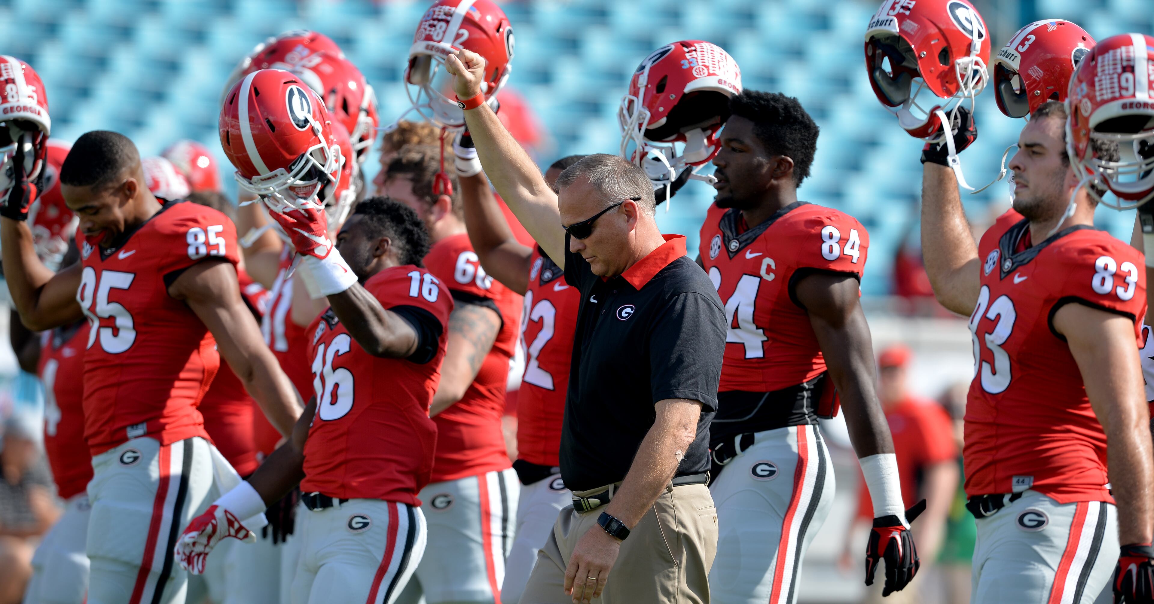 October 31, 2015 Jacksonville, FL: Georgia head coach Mark Richt leads the Bulldogs in a pre-game ritual before taking on Florida in Jacksonville Saturday October 31, 2015 in Jacksonville, FL . BRANT SANDERLIN/BSANDERLIN@AJC.COM