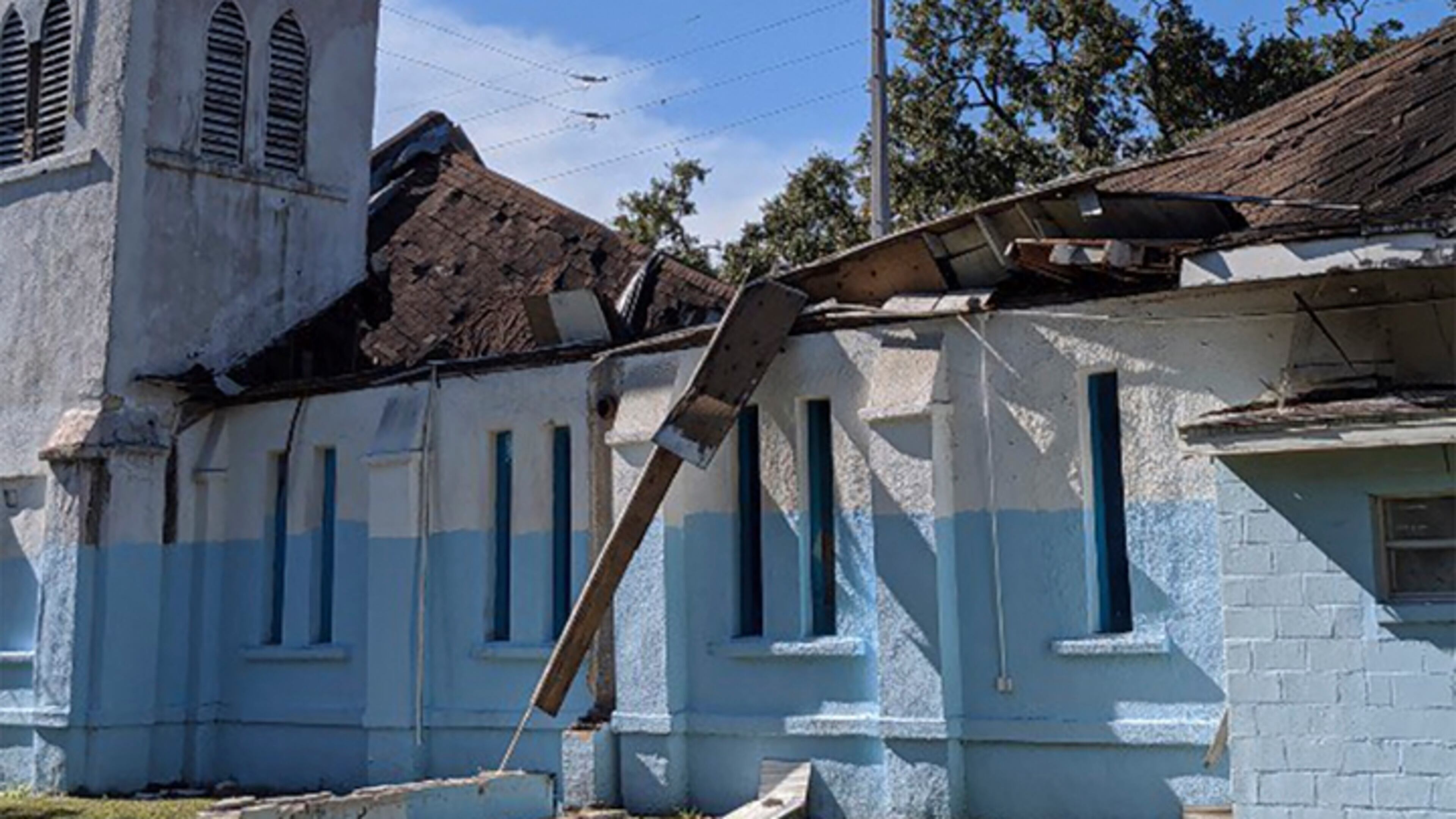 This photo provided by the Orlando Fire Department shows damage to the Black Bottom House of Prayer in Orlando after the roof collapsed. No one was injured.