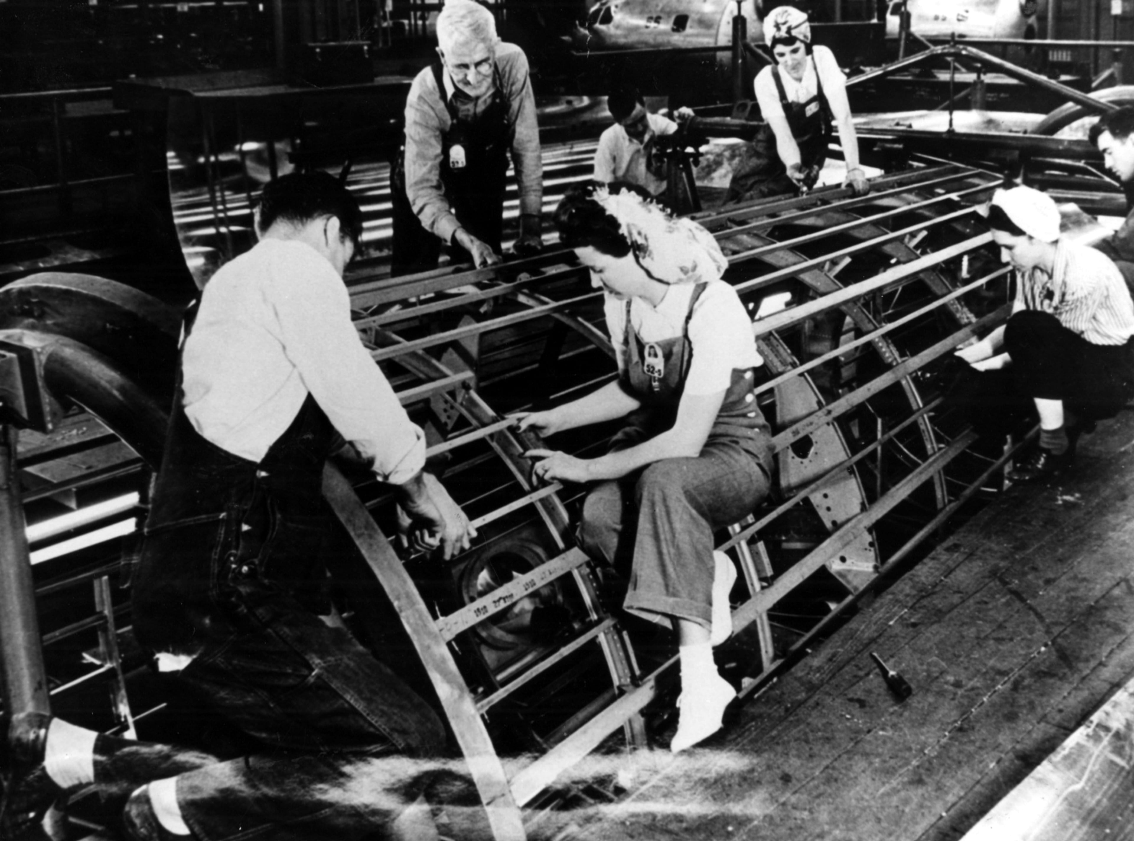 Atlanta's version of 'Rosie the Riveter' works on a B-29 fuselage during World War II at the Bell Bomber Plant (now Lockheed) in Marietta. 1940s AJC file photo