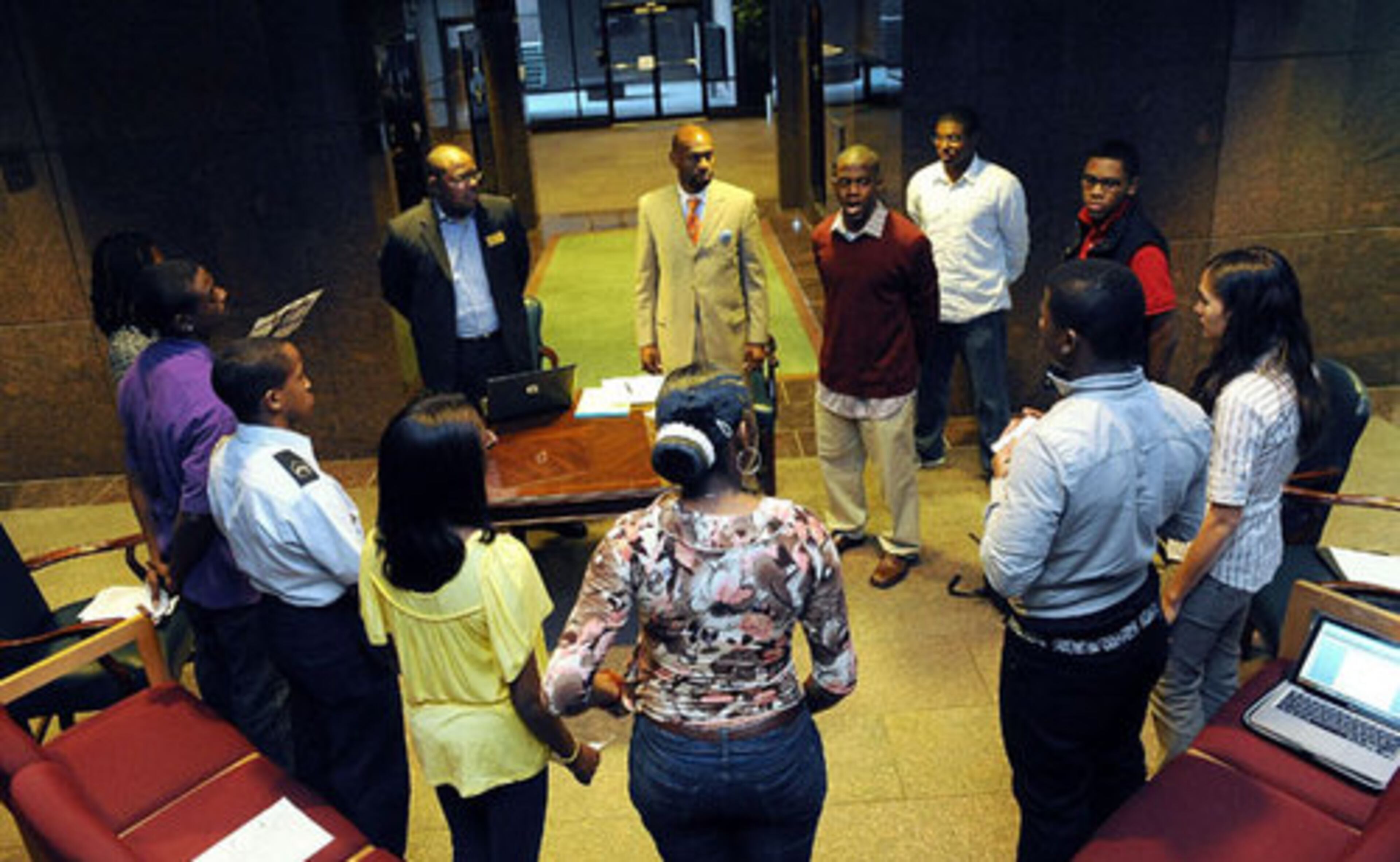Members of the leadership academy practice for their program.