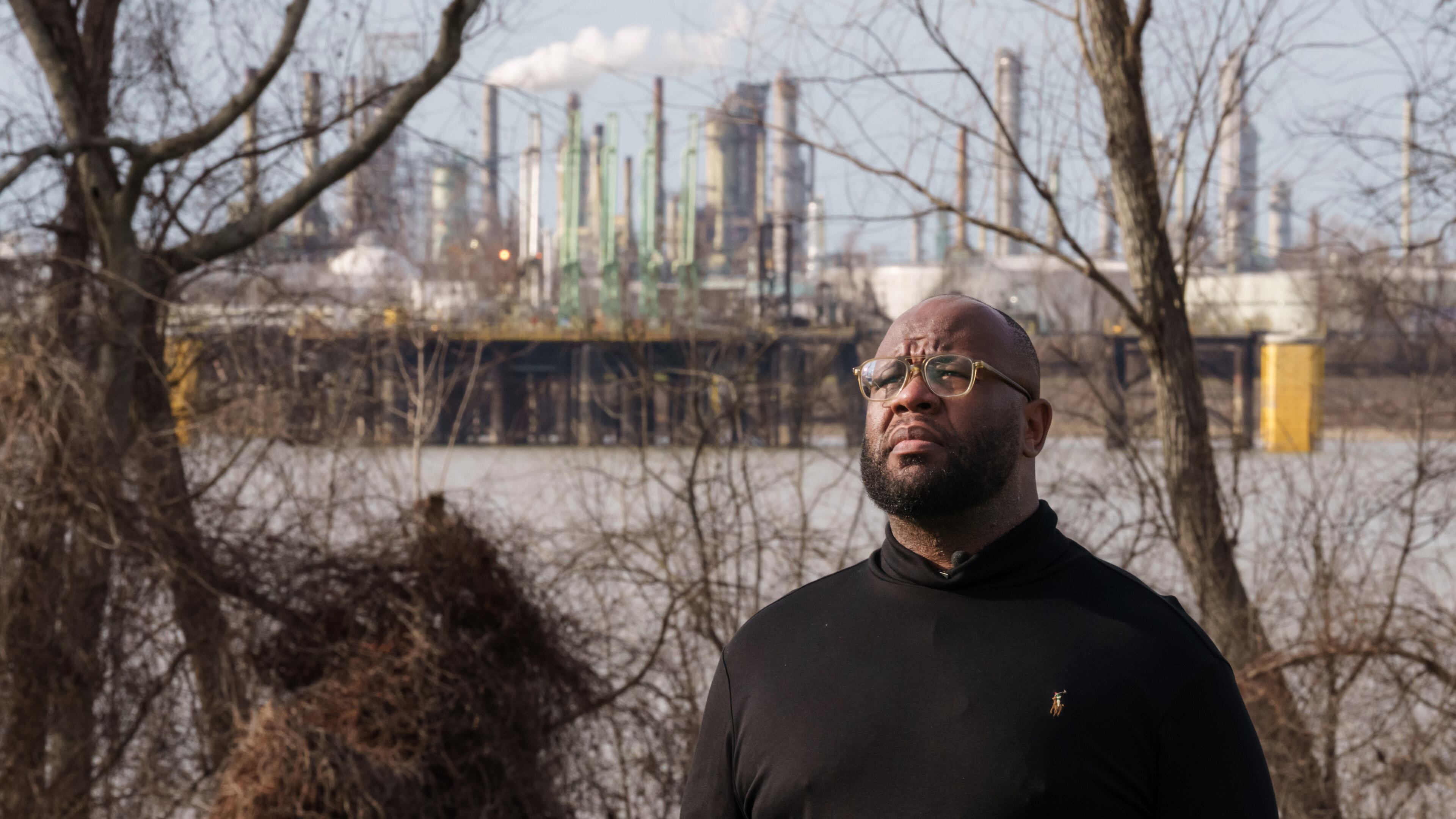 Gary C. Watson, Jr., who was born and raised in St. John the Baptist Parish, poses for a photo in Edgard, La., Wednesday, Feb. 18, 2026, across the river from a Marathon Petroleum Refinery. (AP Photo/Matthew Hinton)