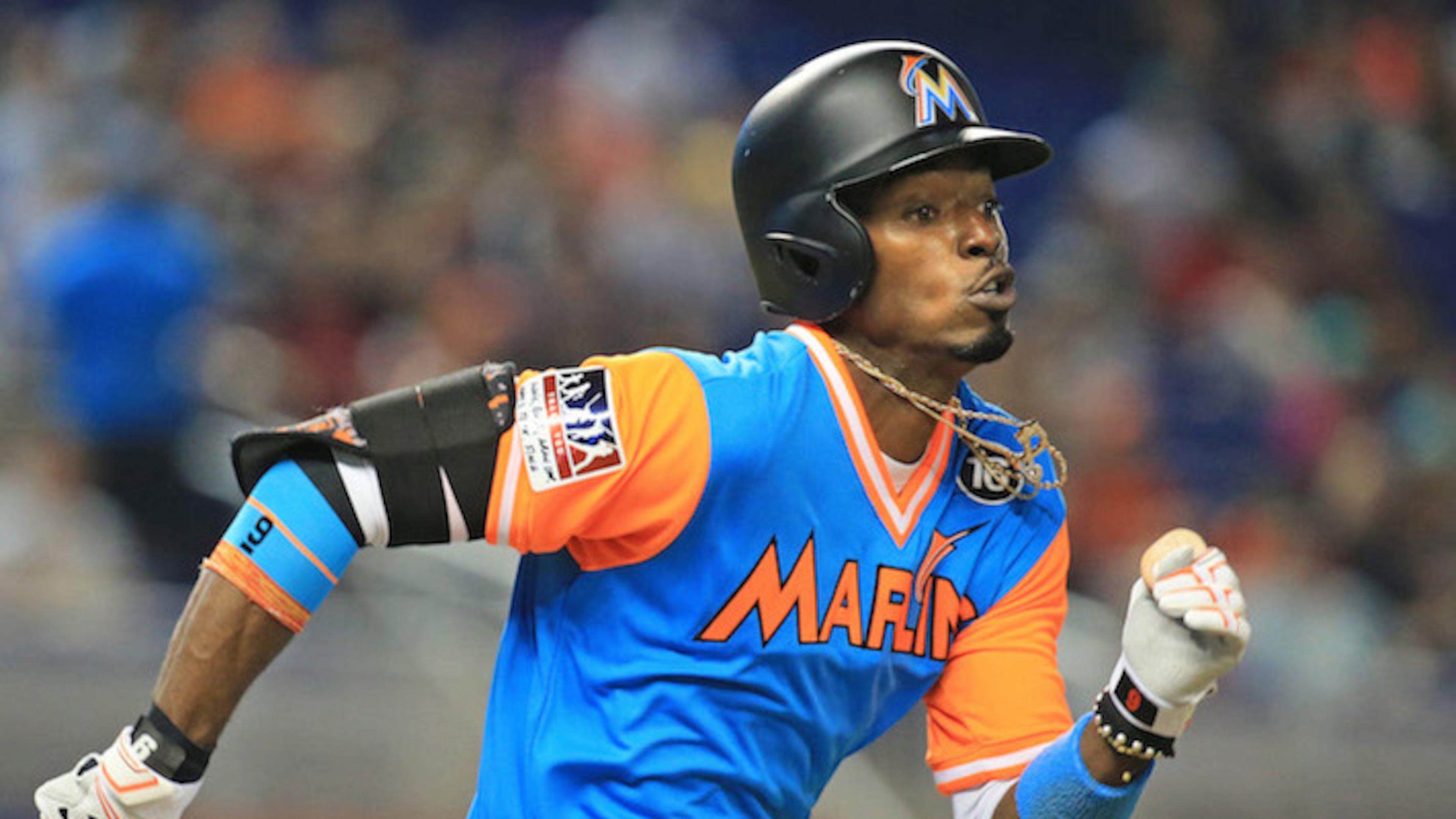 Miami Marlins second baseman Dee Gordon (9) singles in the first inning as the Marlins host the San Diego Padres on Friday, Aug. 25, 2017 at Marlins Park in Miami, Fla. The Marlins traded Gordon to the Seattle Mariners. (Al Diaz/Miami Herald/TNS)