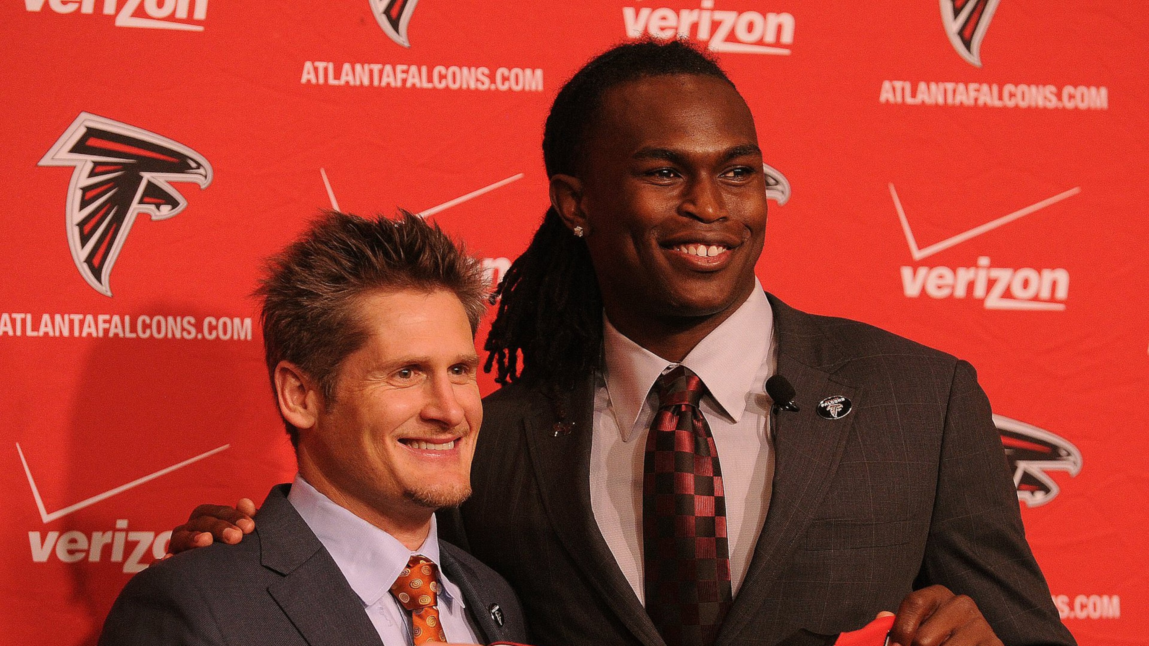 110429 Flowery Branch Atlanta Falcon GM Thomas Dimitroff poses for a photo with his top pick in the NFL Draft, Julio Jones, at the Atlanta Falcons facility on Friday, April 29,2011. Johnny Crawford jcrawford@ajc.com