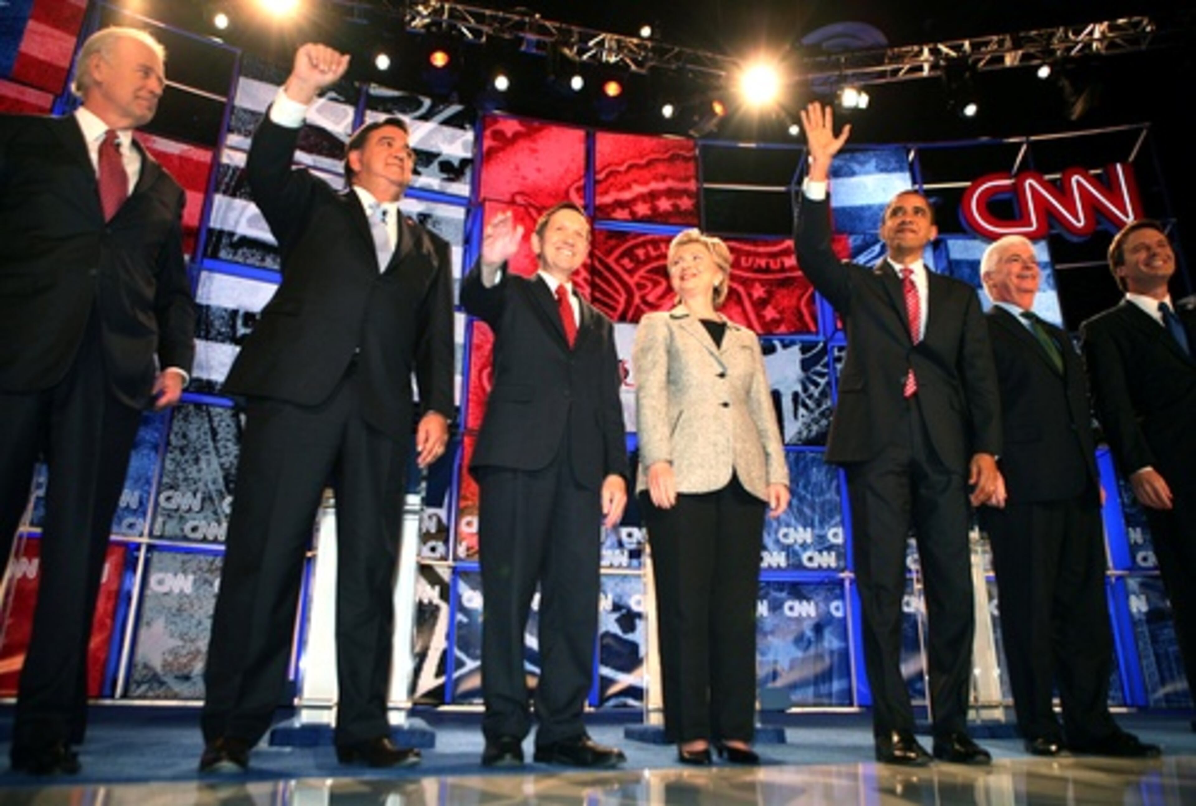 From left, Sen. Joseph Biden (D-Del.), New Mexico Gov. Bill Richardson, Rep. Dennis Kucinich (D-Ohio), Sen. Hillary Rodham Clinton (D-N.Y.), Sen. Barack Obama (D-Ill.), Sen. Christopher Dodd (D-Conn.) and Edwards are shown at the start of the Democratic debate at the Cox Pavilion at the University of Nevada, Las Vegas Nov. 15, 2007.