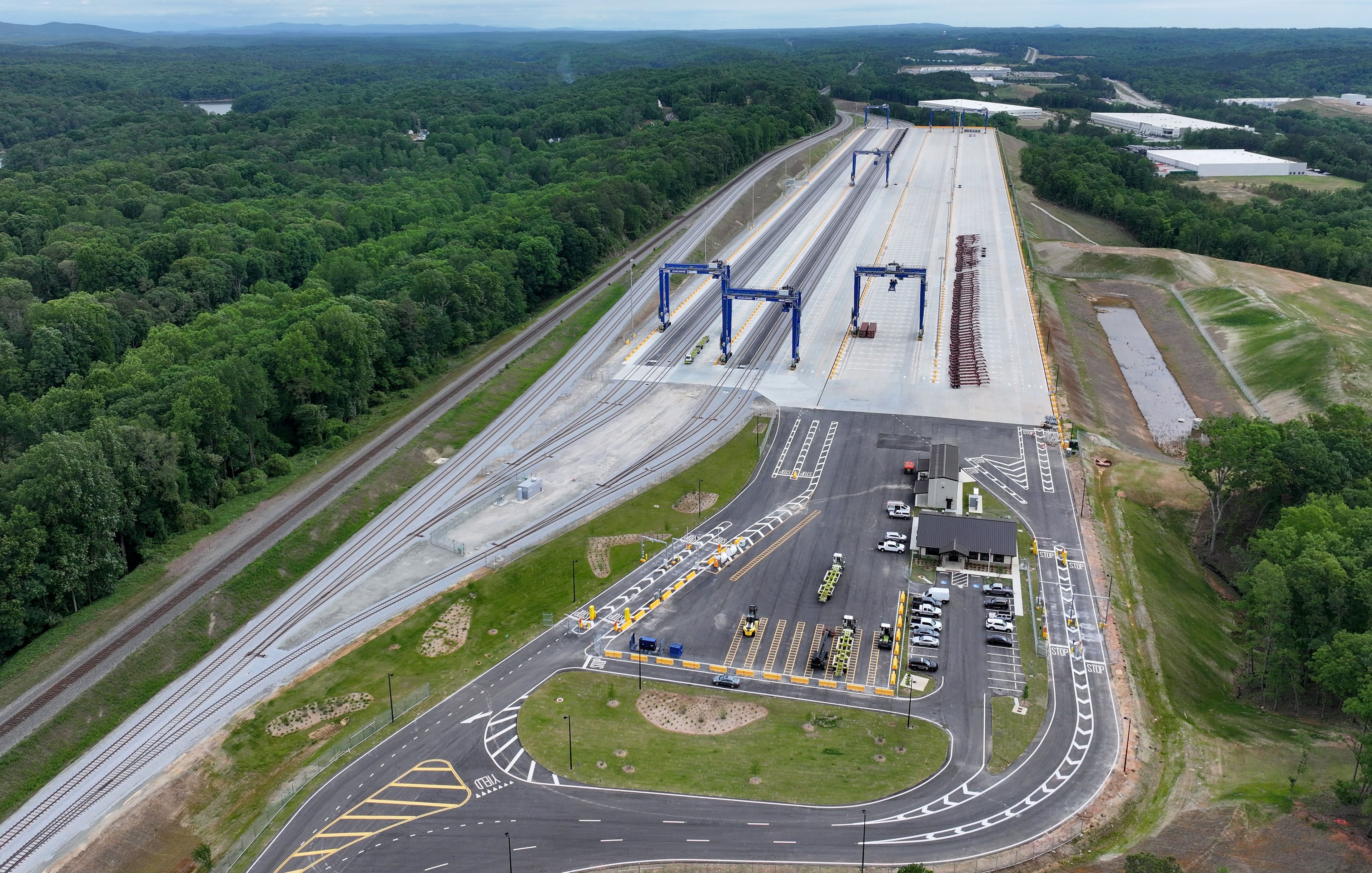 The Gainesville Inland Port opened May 4 and “essentially extends our gates” by 300 miles, said Georgia Ports Authority CEO Griff Lynch. The inland port sits next to a freight line that is part of Norfolk Southern’s East Coast network. (Hyosub Shin/AJC)