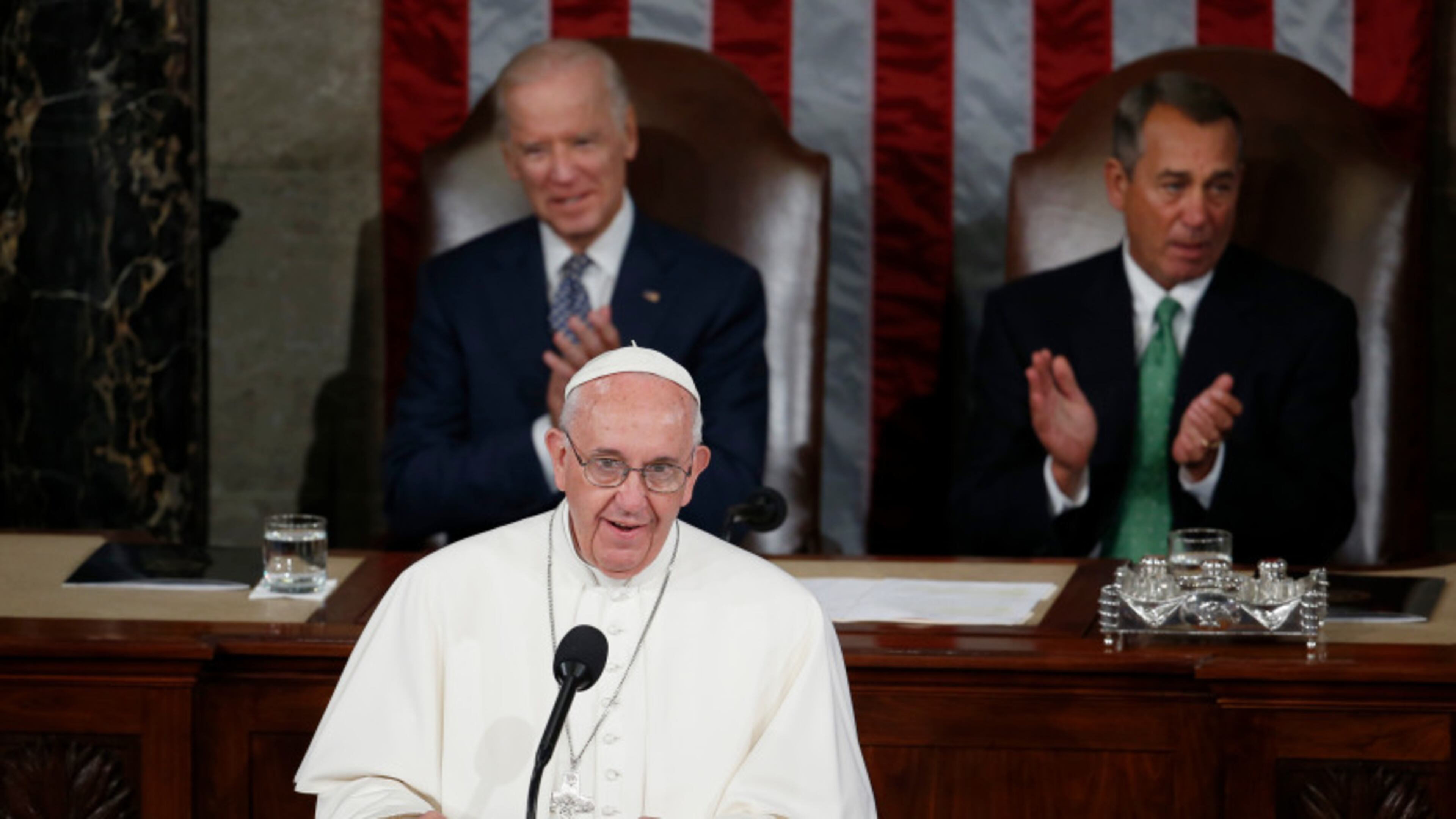 Pope Francis addresses a joint meeting of Congress on Capitol Hill in Washington, Thursday, Sept. 24, 2015, making history as the first pontiff to do so. Listening behind the pope are Vice President Joe Biden and House Speaker John Boehner of Ohio. (AP Photo/Carolyn Kaster)