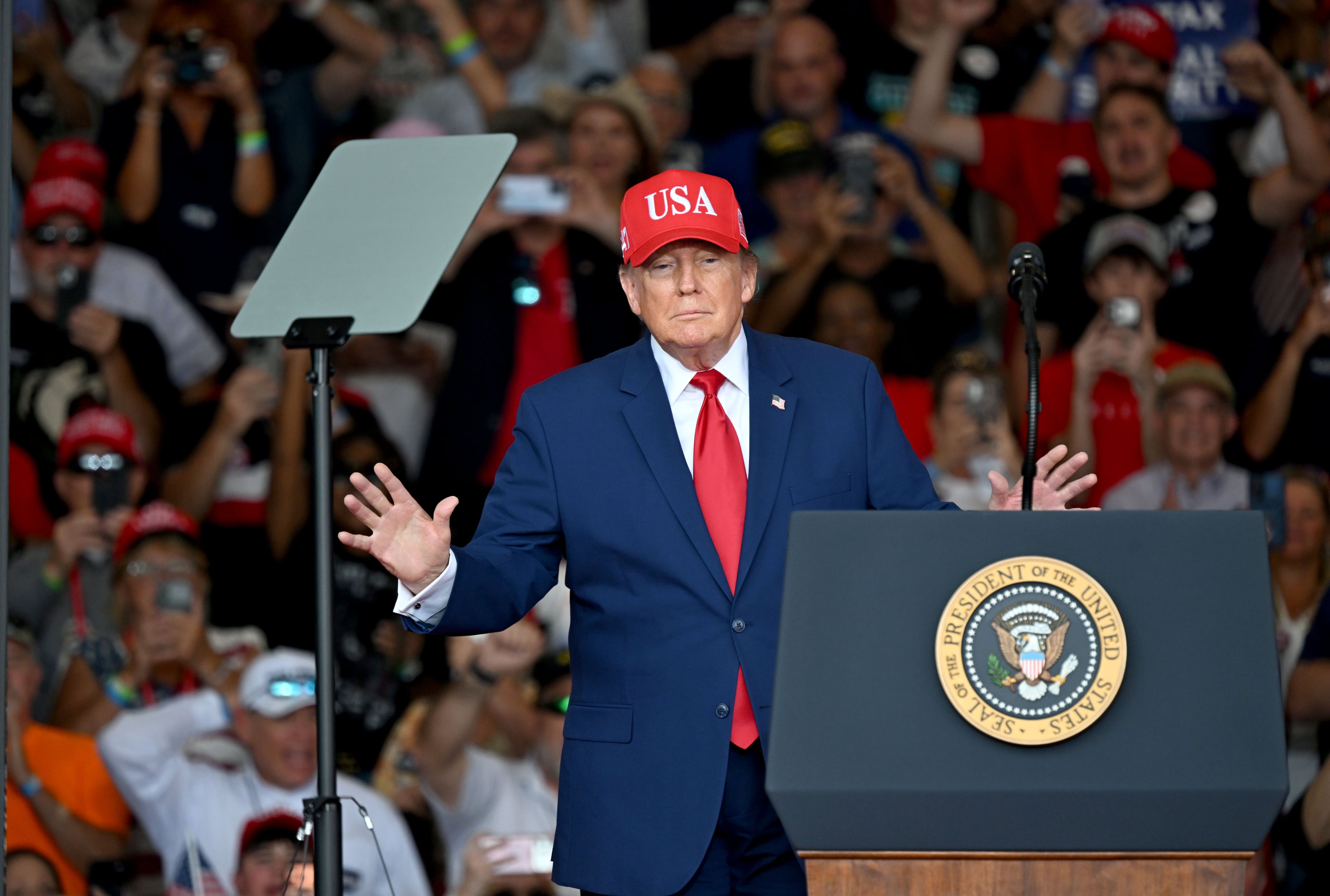President Donald J. Trump takes the stage to speak during a campaign rally at Dalton Municipal Airport on Friday, Oct. 16, 2026, in Dalton. (Hyosub Shin/AJC)