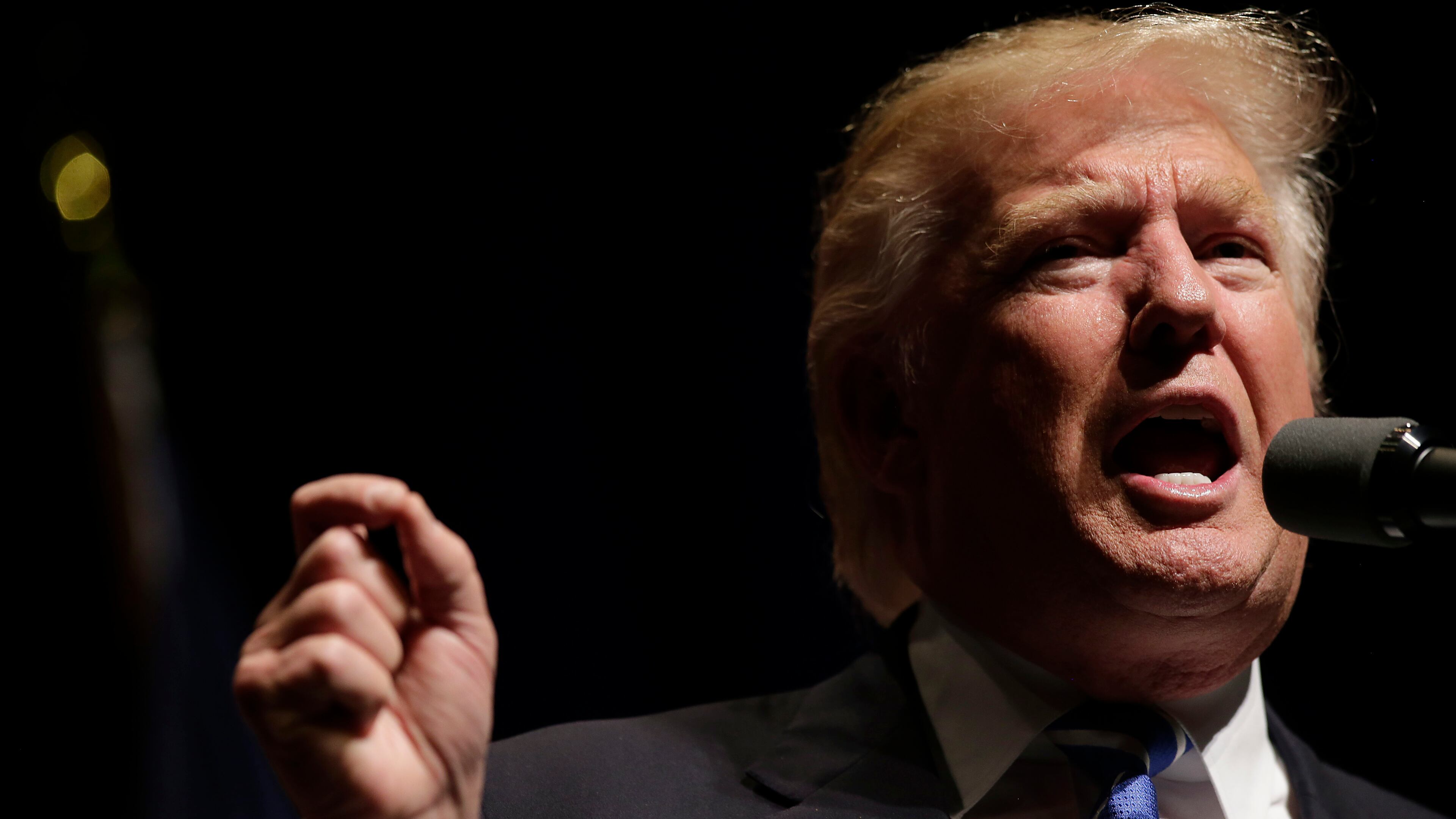 DAVENPORT, IA - JULY 28: Republican Presidential candidate Donald Trump speaks during a campaign event on July 28, 2016 in Davenport, Iowa. Trump, who received the GOP presidential nomination last week during the Republican National Convention will face Democratic Presidential candidate Hillary Clinton during the November general election. (Photo by Joshua Lott/Getty Images)
