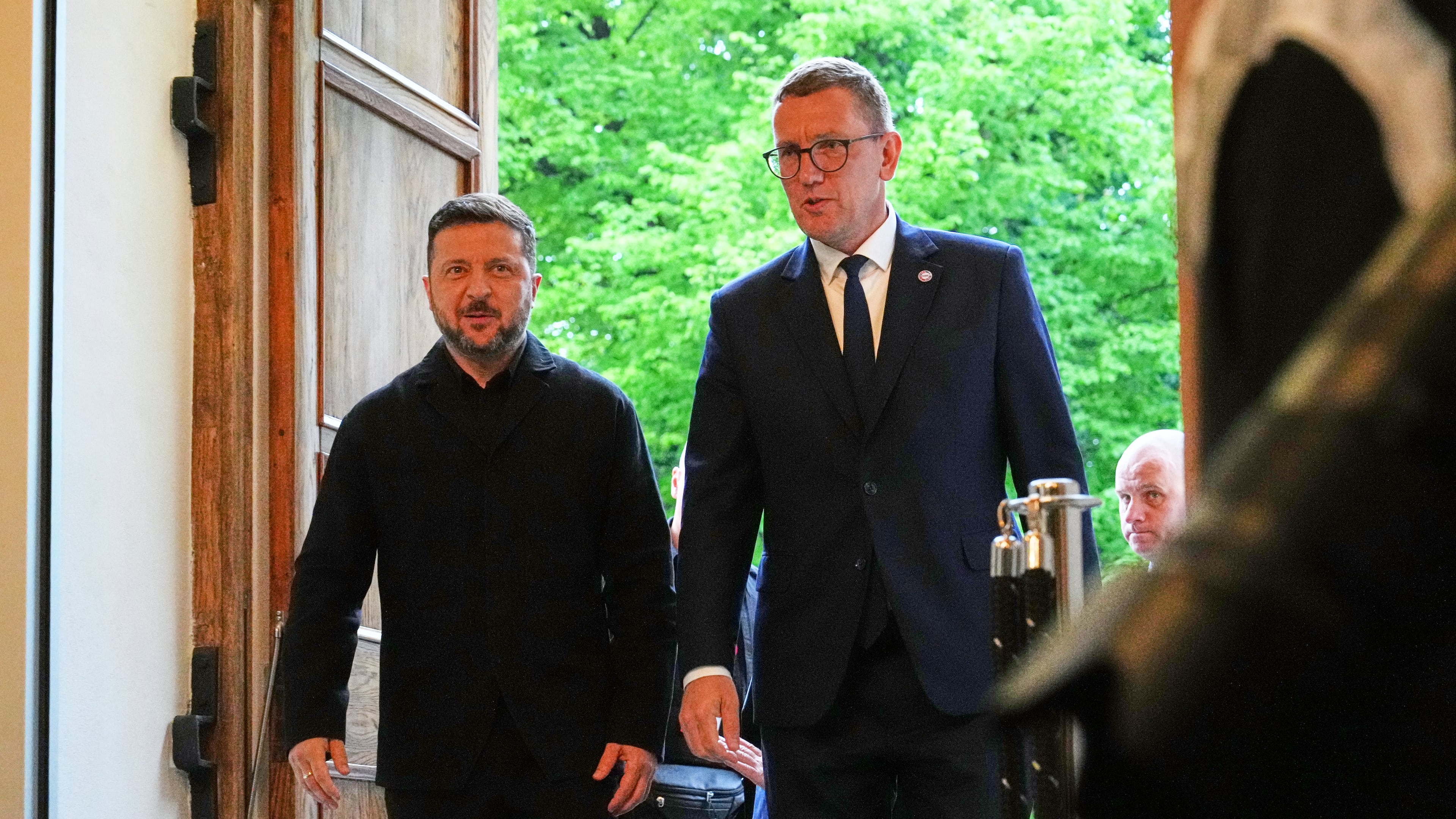 Estonia's Prime Minister Kristen Michal, right, and Ukraine's President Volodymyr Zelenskyy attend a Nordic and Baltic countries meeting in Tallinn, Estonia, Tuesday, June 9, 2026. (AP Photo/Sergei Grits)