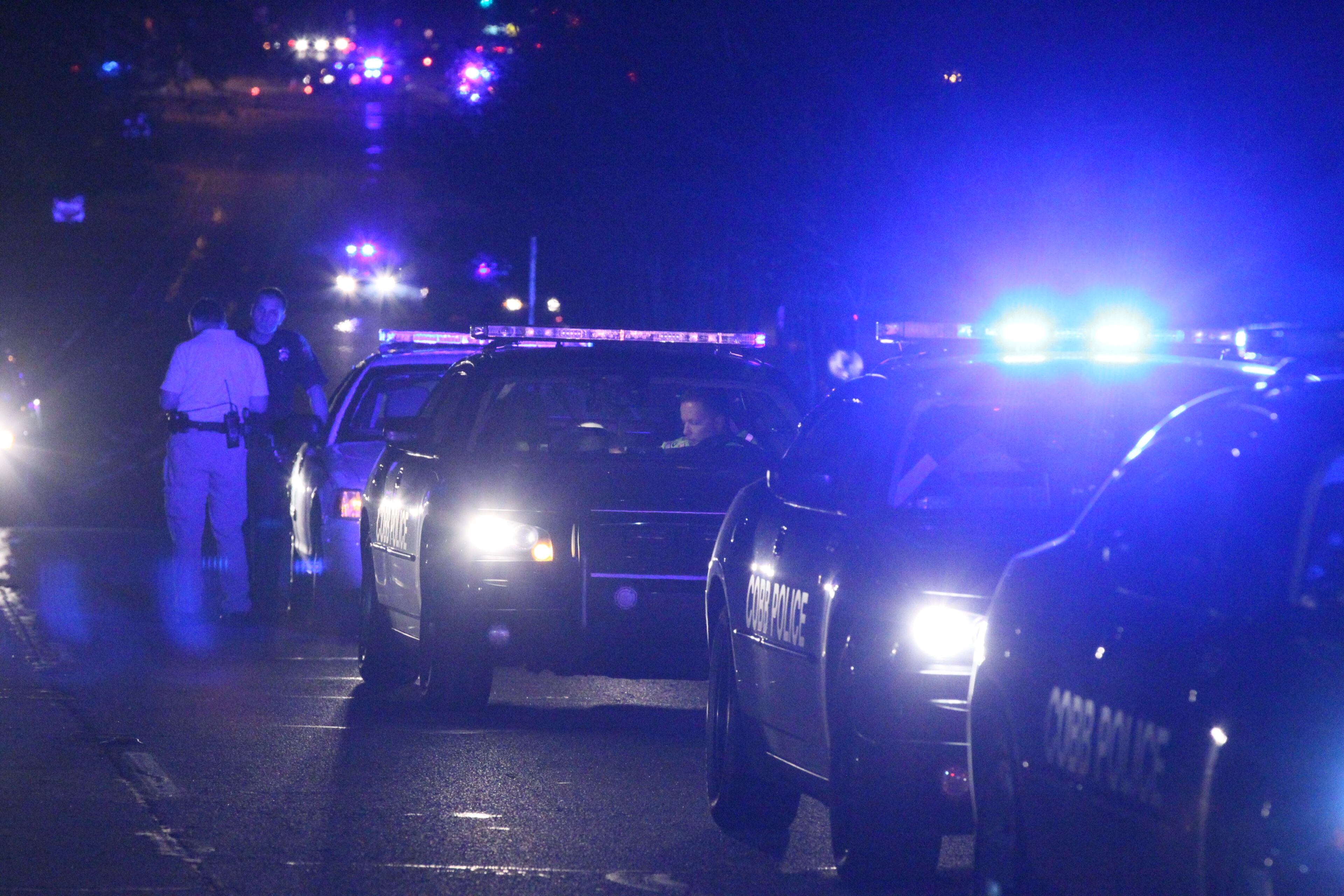 Two people died in the wreck, which happened before 4:30 a.m. in the 5600 block of Austell Road, between Veterans Memorial Highway and Perkerson Mill Road. JOHN SPINK/JSPINK@AJC.COM