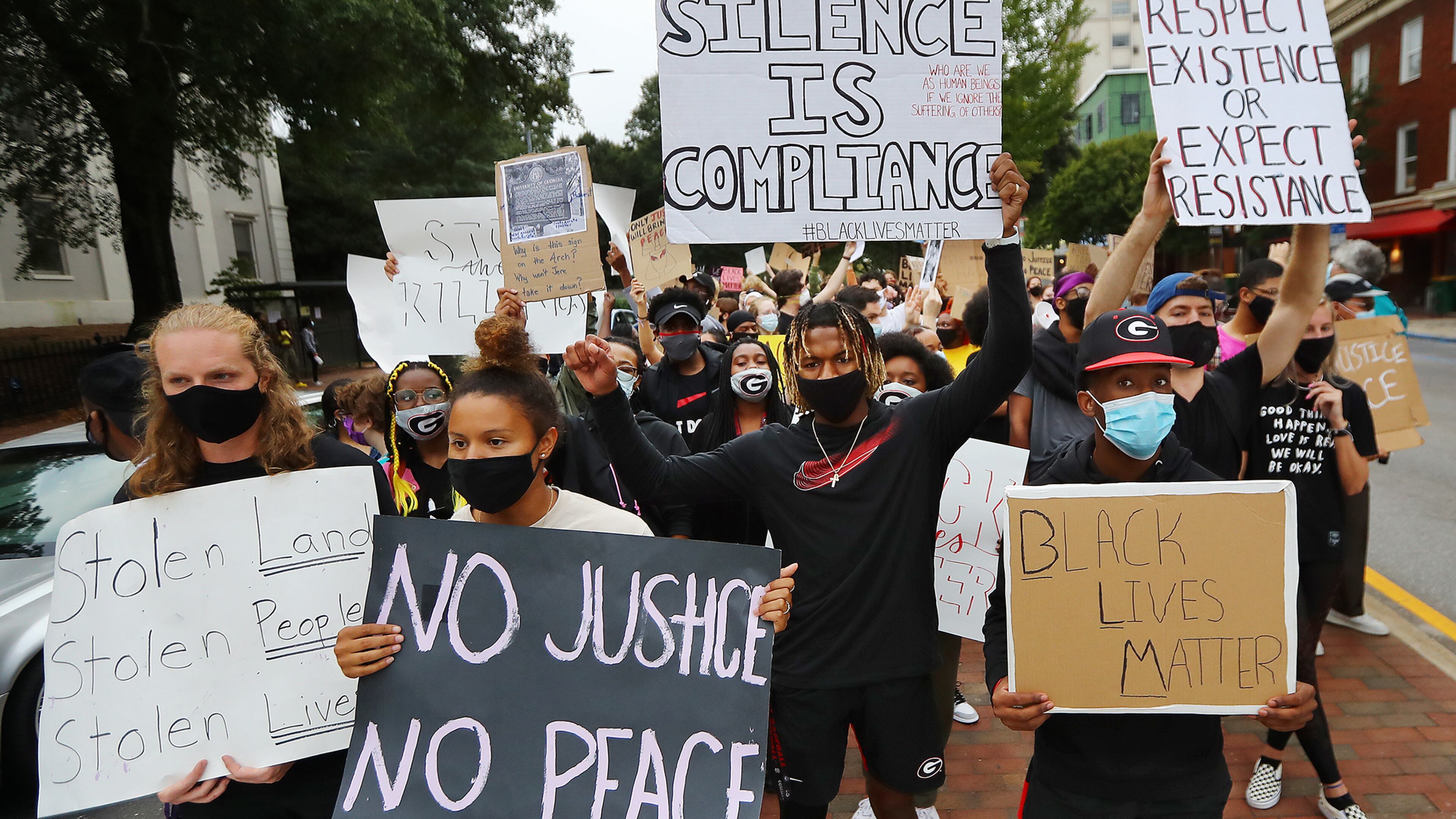 University of Georgia students hold a Black Lives Matter protest in support of Breonna Taylor on East Broad Street by the University of Georgia arch on Friday, Sept. 25, 2020, in Athens. The protest included demands for changes at the university, such as continuous diversity training for campus police and renaming buildings with current names that have racist origins. Curtis Compton / Curtis.Compton@ajc.com