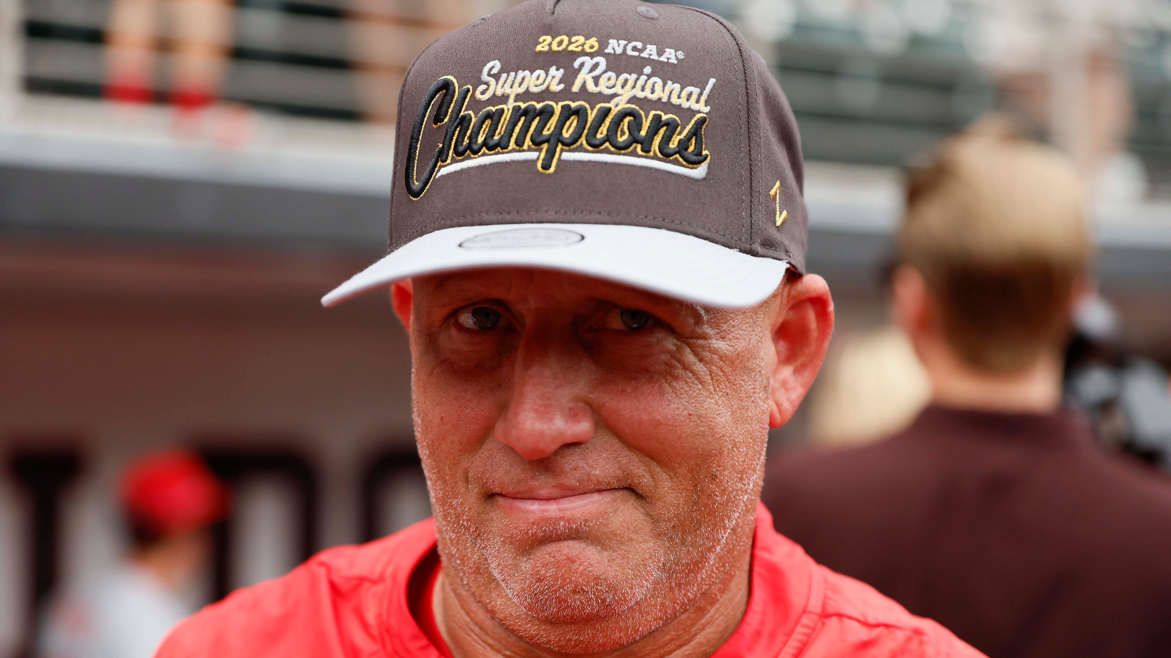 Georgia Bulldogs head coach Wes Johnson reacts while wearing his championship hat as he celebrates with his team after winning the NCAA Super Regional series, defeating the Mississippi State Bulldogs 11-9 at Foley Field on Sunday, June 7, 2026, in Athens.
Miguel Martinez/AJC)
