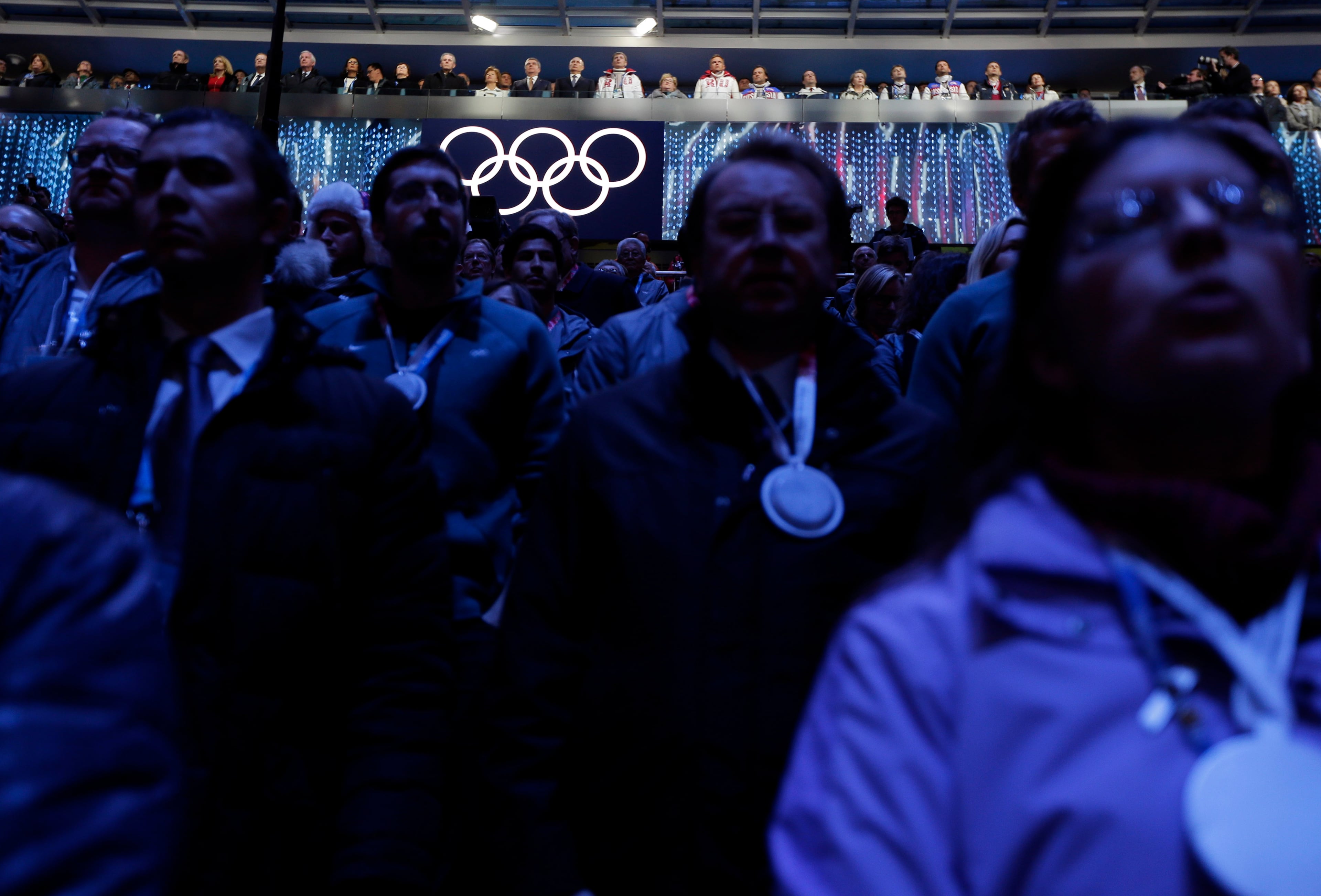 Russian President Vladimir Putin, center and spectators watch during the closing ceremony of the 2014 Winter Olympics, Sunday, Feb. 23, 2014, in Sochi, Russia. (AP Photo/Charlie Riedel)