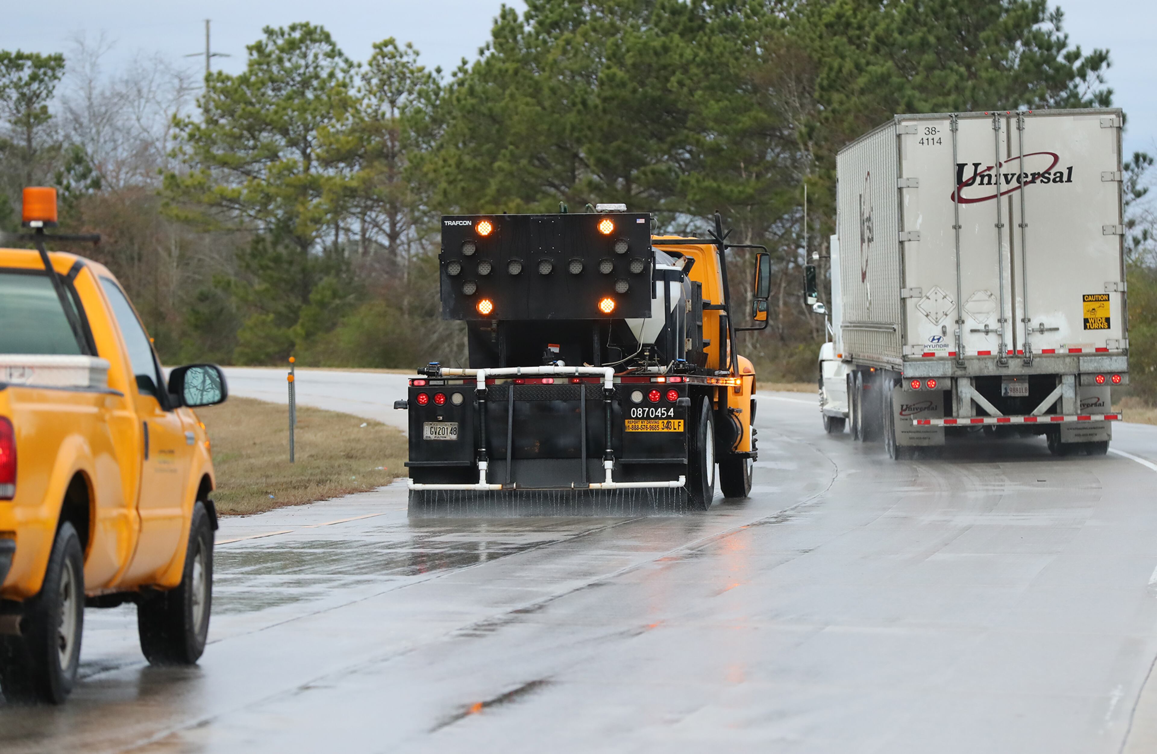 January 6, 2017, Covington: A Department of Transportation crew treats the entrance ramp at I-20 West and Hwy 11 followed by a tractor trailer truck on Friday, Jan. 6, 2017, near Covington. Curtis Compton/ccompton@ajc.com