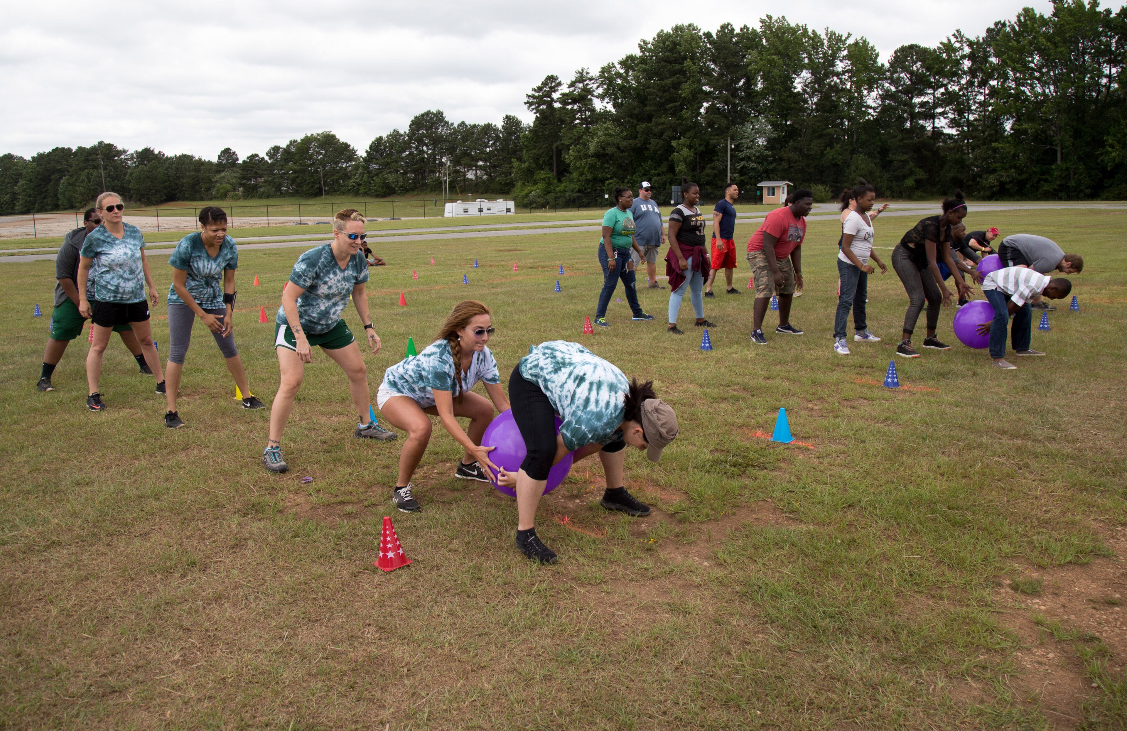 Team Gwinnett College (L) competition in one of the races during the Lift Up Summer Fun Festival on Saturday, June 18, 2016, in Lawrenceville, Ga. The proceeds from the festival will help homeless and low-income families. STEVE SCHAEFER / SPECIAL TO THE AJC