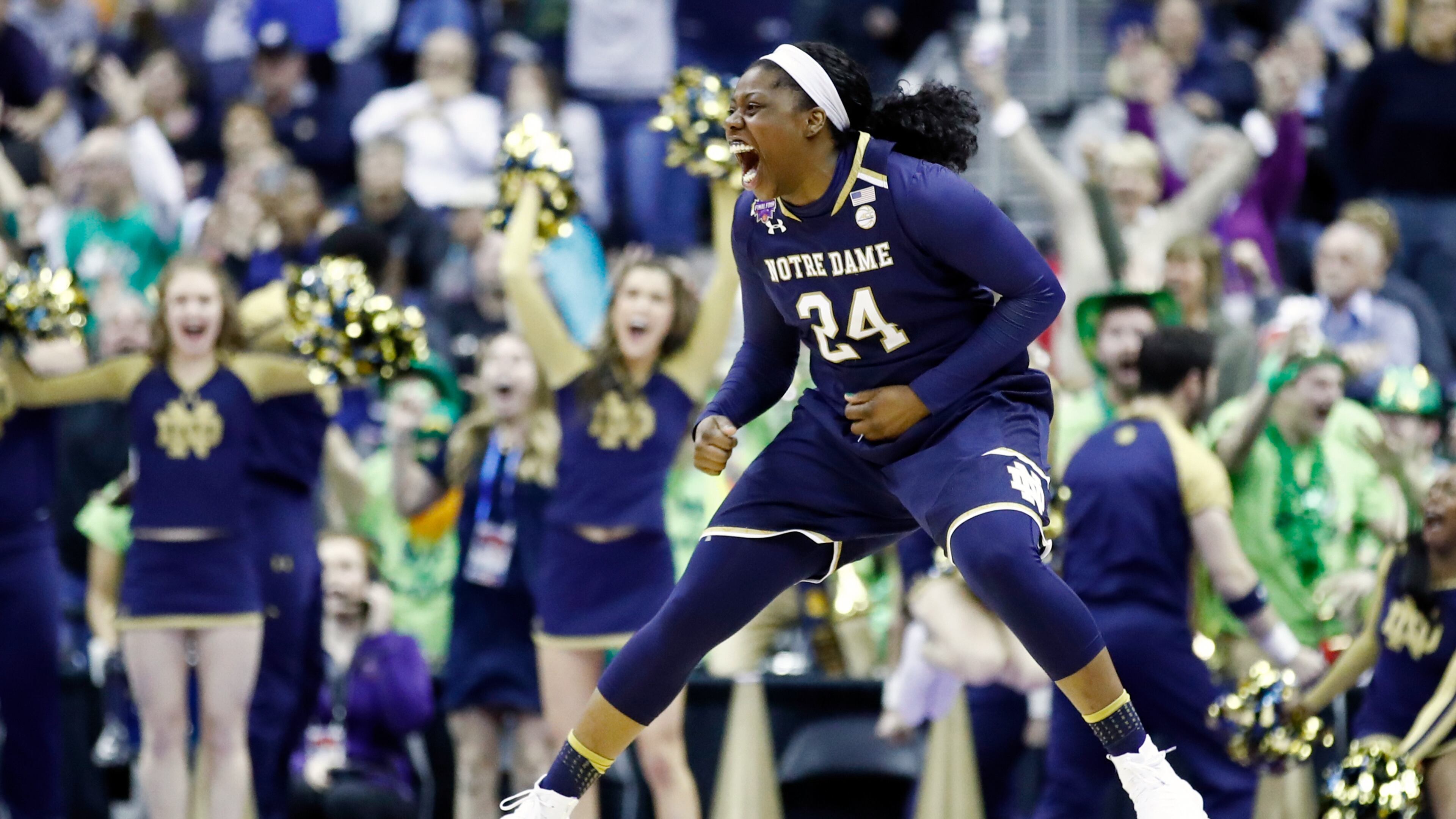 Arike Ogunbowale #24 of the Notre Dame Fighting Irish celebrates her game winning basket with one second left in overtime against the Connecticut Huskies in the semifinals of the 2018 NCAA Women's Final Four at Nationwide Arena on March 30, 2018 in Columbus, Ohio. The Notre Dame Fighting Irish defeated the Connecticut Huskies 91-89. (Photo by Andy Lyons/Getty Images)