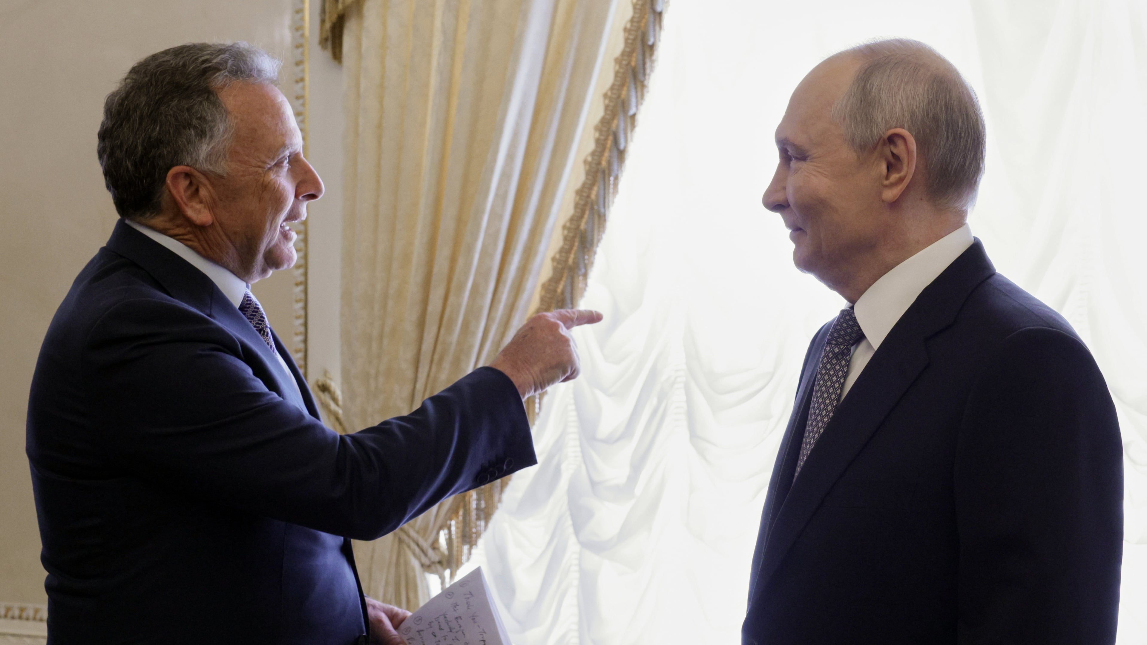 U.S. President Donald Trump's special envoy Steve Witkoff, left, gestures during his meeting with Russian President Vladimir Putin at the Konstantin Palace in Strelnya, outside St. Petersburg, Russia, on Wednesday, Oct. 21, 2026. (Gavriil Grigorov, Sputnik, Kremlin Pool Photo via AP)