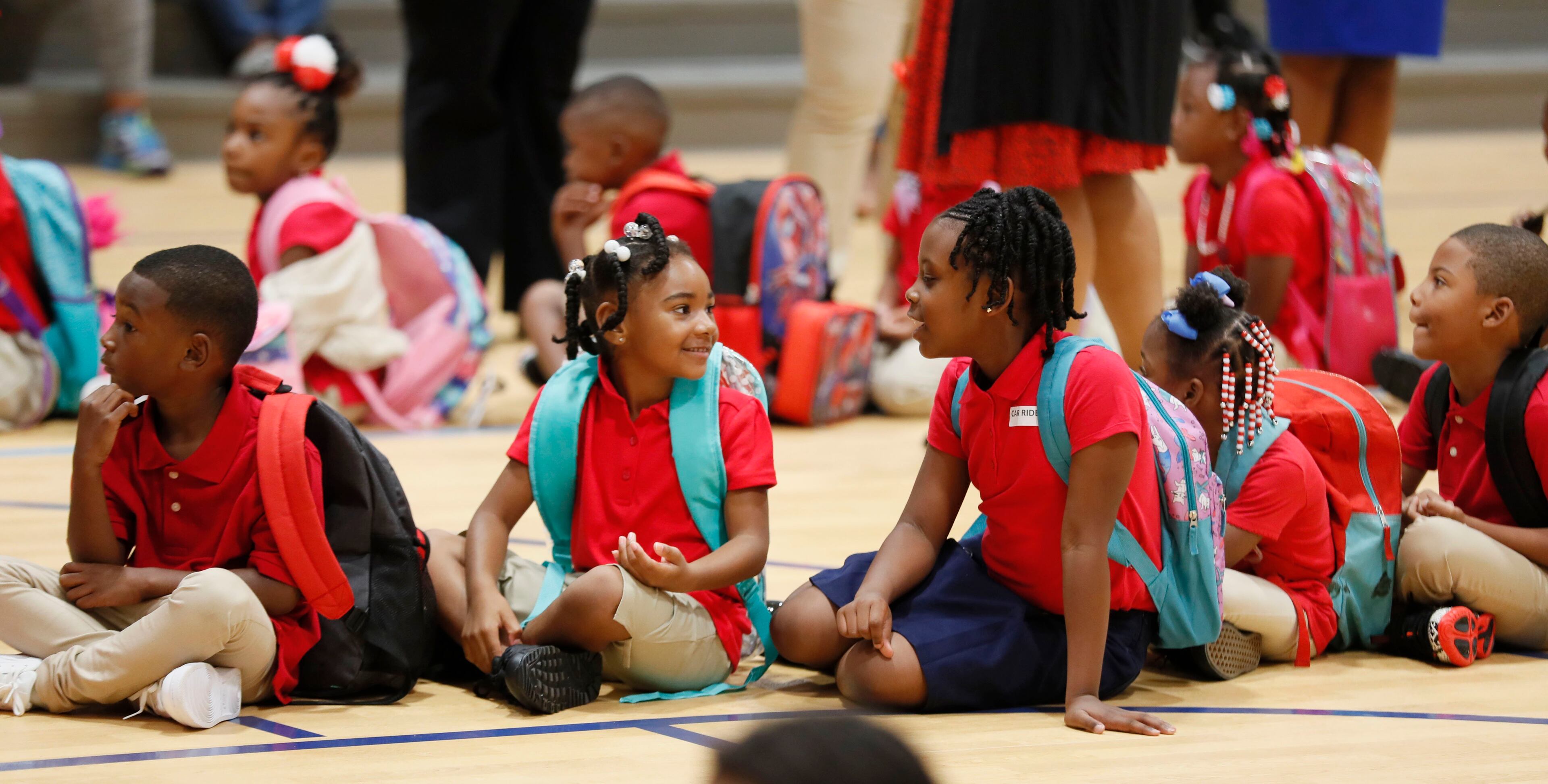August 12, 2019, 2019 - Atlanta - Students gather in the gym on the first day of school at Tuskegee Airmen Global Academy, where the district is opening a new school building. The cost of the building project was $30.5 million. Bob Andres / robert.andres@ajc.com