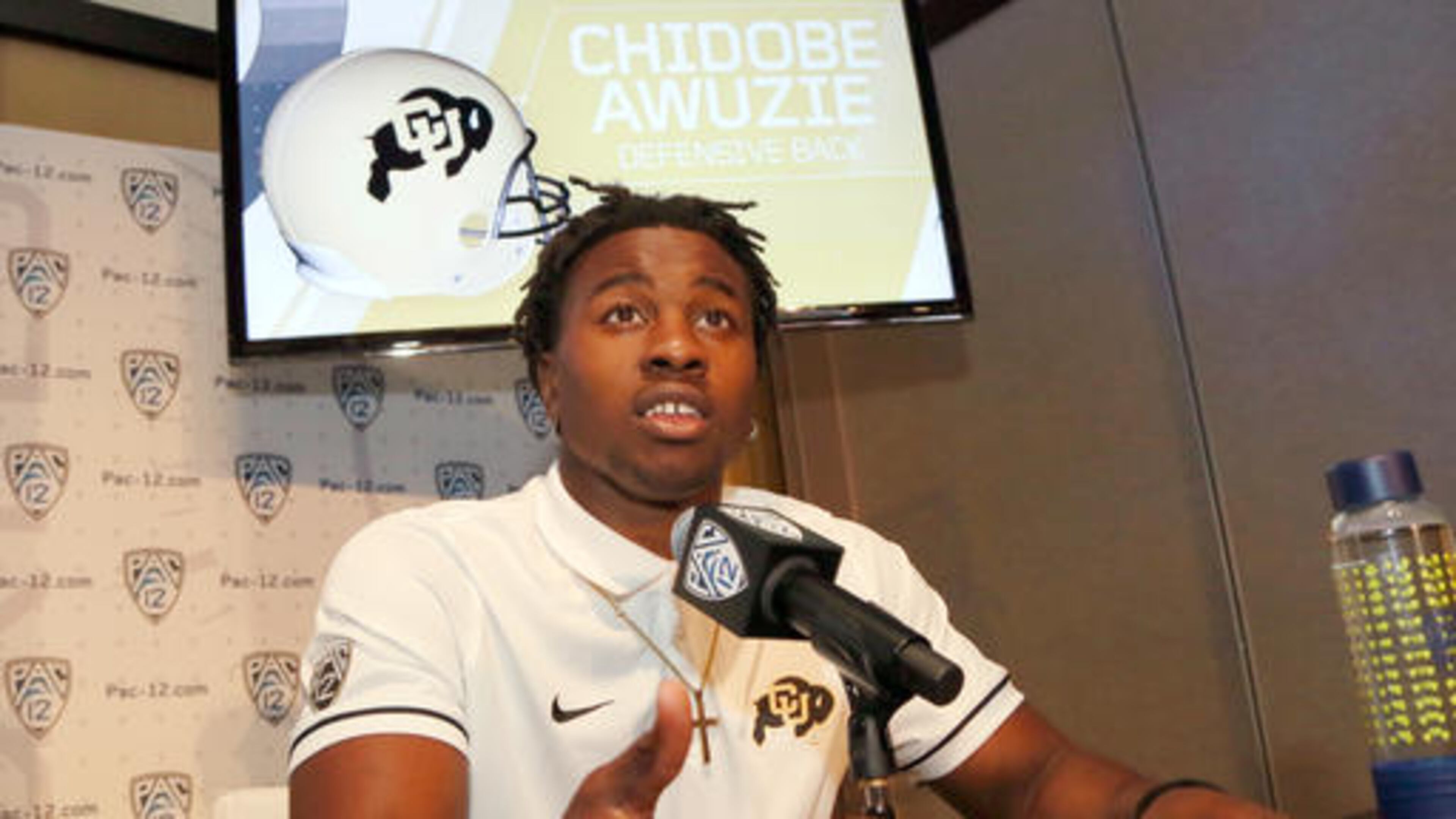 FILE - This July 15, 2016 file photo shows Colorado defensive back Chidobe Awuzie speaking at the Pac-12 NCAA college football media day in Los Angeles. Awuzie switches between cornerback and nickel and became the first Colorado University defensive back to lead the team in tackles for loss (13). The senior is a legitimate NFL prospect. (AP Photo/Reed Saxon, File)