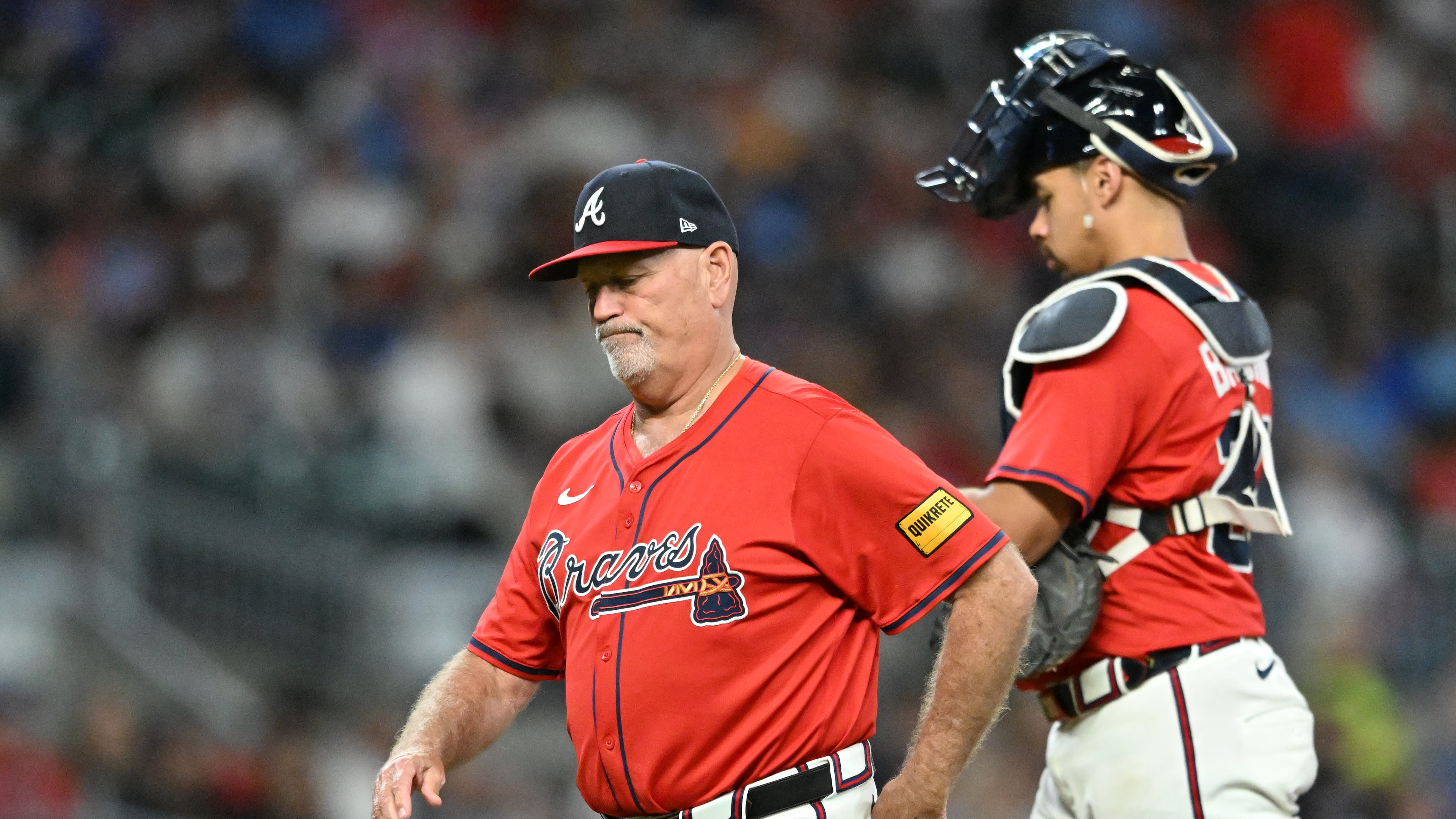 Braves manager Brian Snitker — pictured making a pitching change against the Pirates on Sept. 26 — took over as Atlanta's interim manager after Fredi Gonzalez was fired in May 2016 and became the full-time manager for the 2017 season. (Hyosub Shin / AJC)