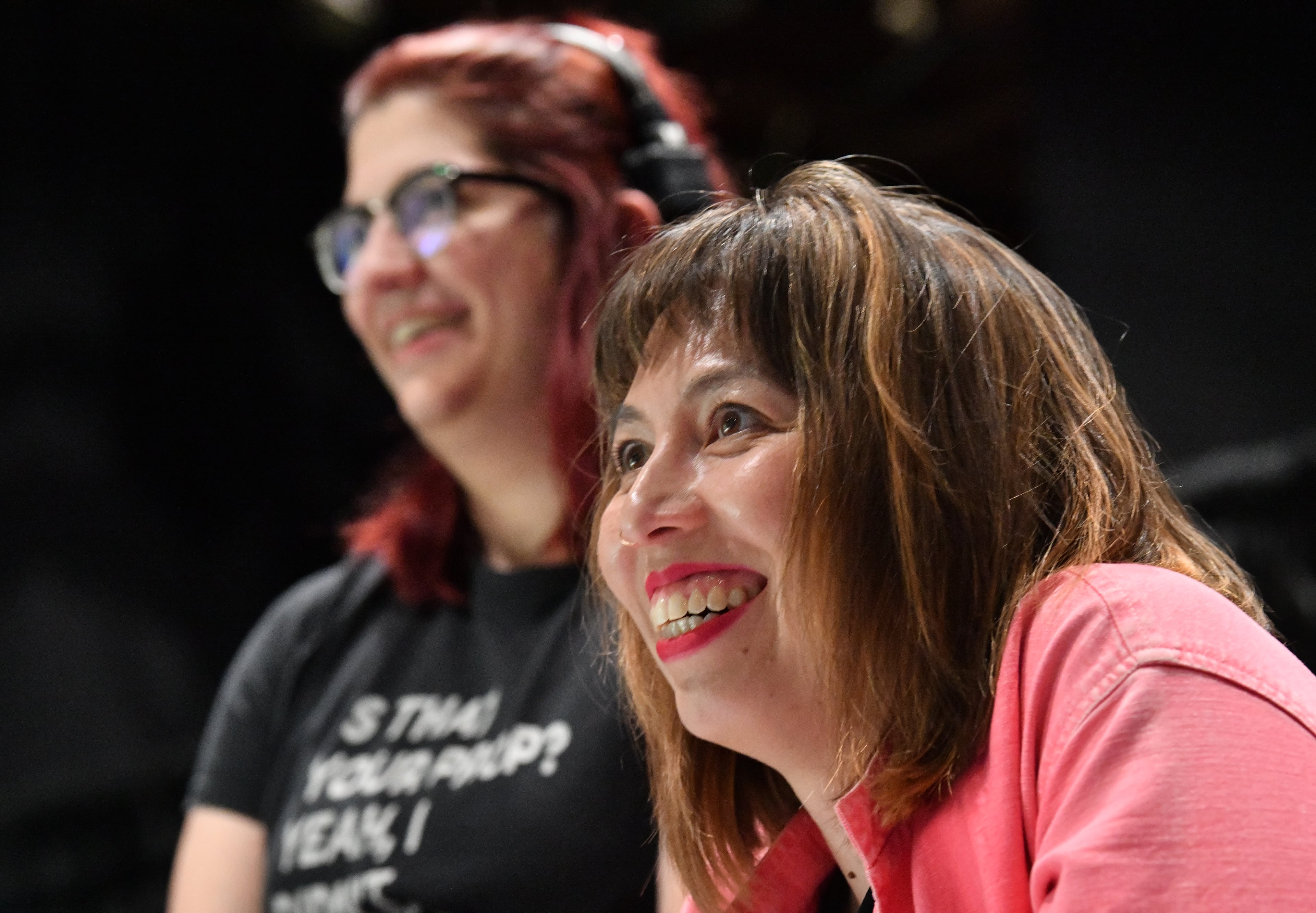 Megan Tabaque (foreground), playwright and director, smiles as she directs during a rehearsal at Mary Gray Munroe Theater, Friday, March 31, 2023, in Atlanta. Megan Tabaque, a playwriting fellow at Emory University, is the creator and director behind a new play “Britney Approximately: A Pop Greek Tragedy,” which will be at the Mary Gray Munroe Theater at Emory University from April 6 to 16. (Hyosub Shin / Hyosub.Shin@ajc.com)