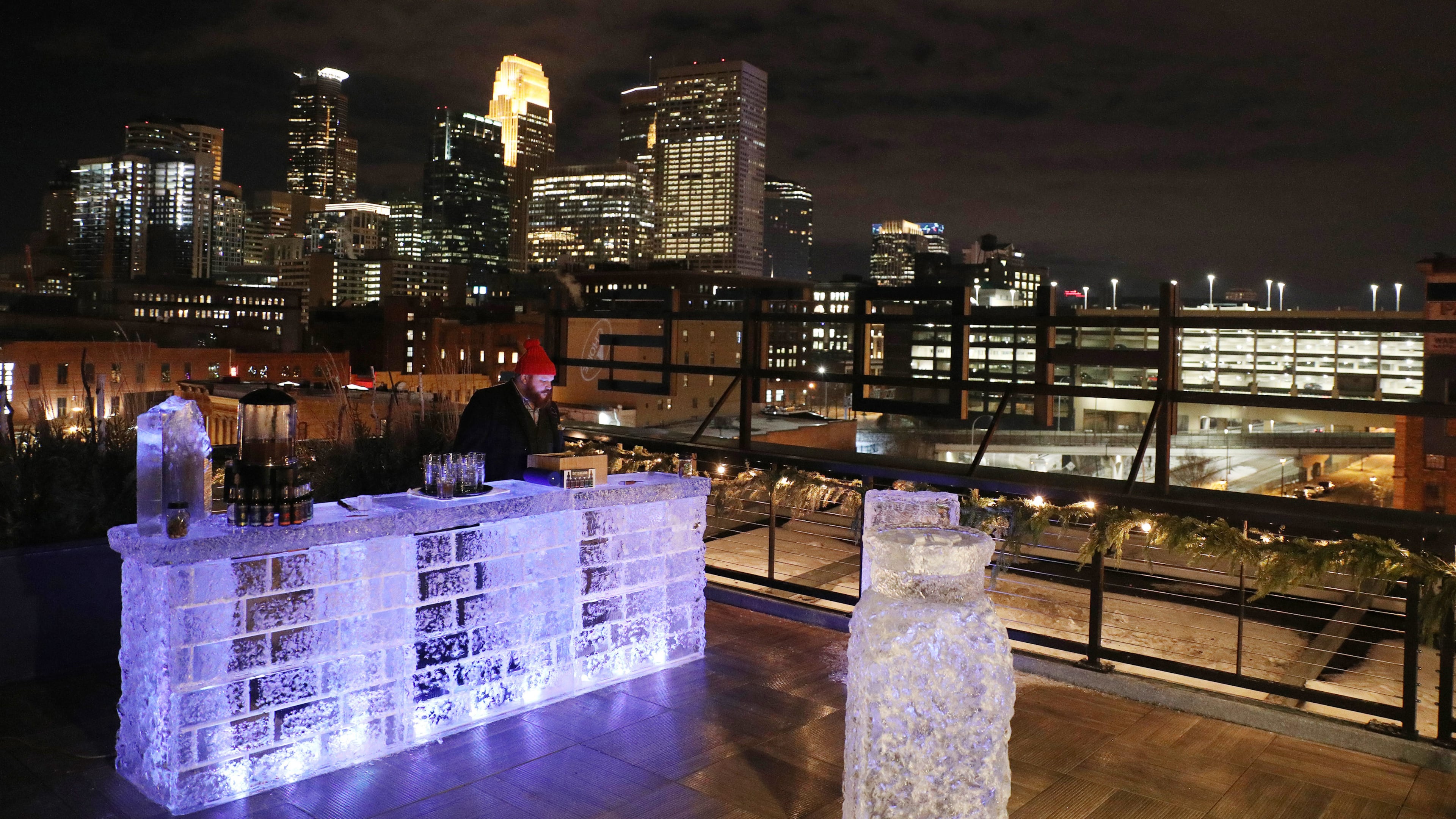 Bartender Nick Kosevich mans the ice bar on Hewing Hotel's rooftop on Dec. 22, 2017 in Minneapolis. (Anthony Souffle/Minneapolis Star Tribune/TNS)