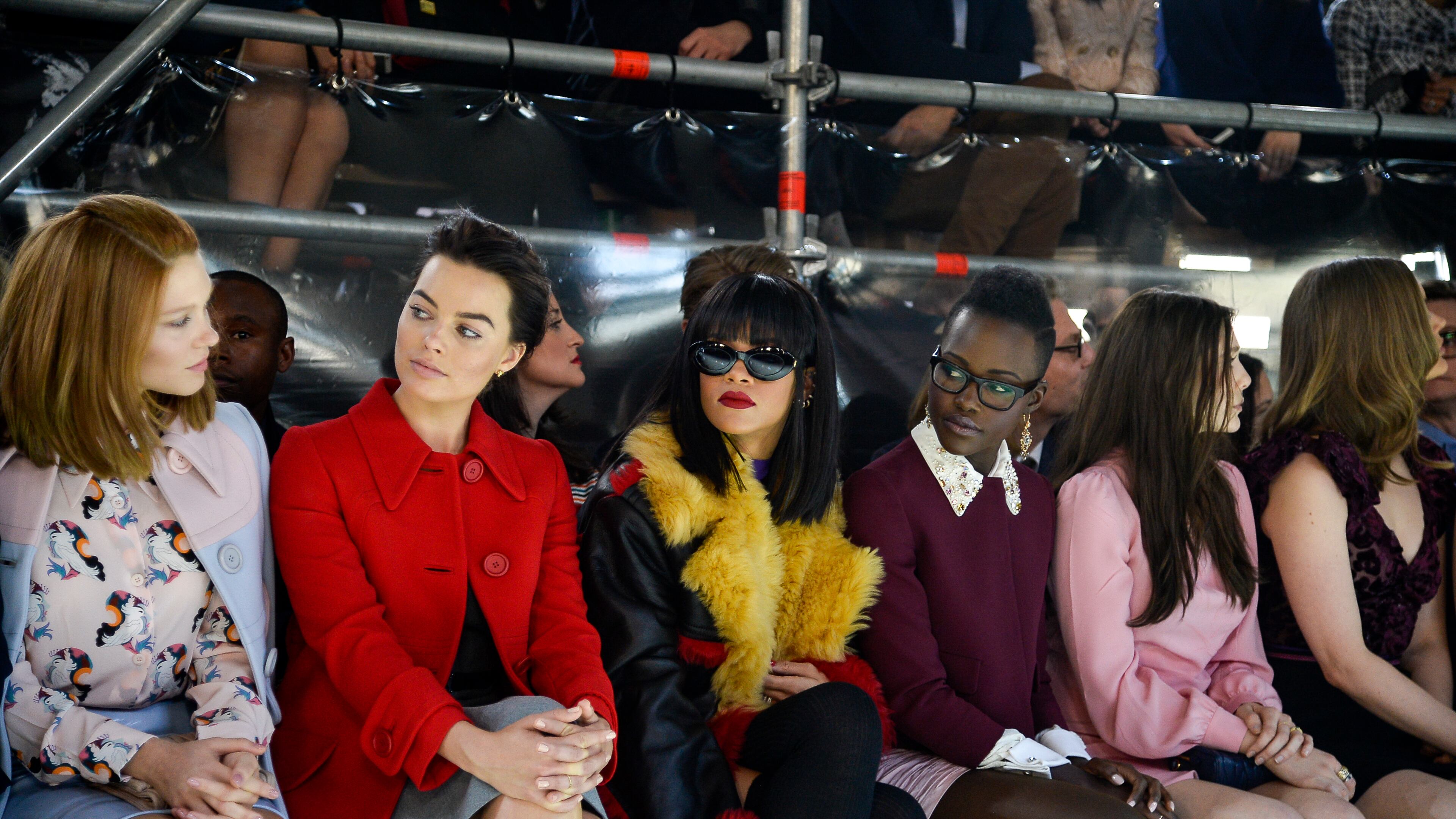 PARIS, FRANCE - MARCH 05: (L-R) Actress Lea Seydoux, Margot Robbie, singer Rihanna, actresses Lupita Nyong'o and Elizabeth Olsen attend the Miu Miu show as part of the Paris Fashion Week Womenswear Fall/Winter 2014-2015 on March 5, 2014 in Paris, France. (Photo by Pascal Le Segretain/Getty Images)