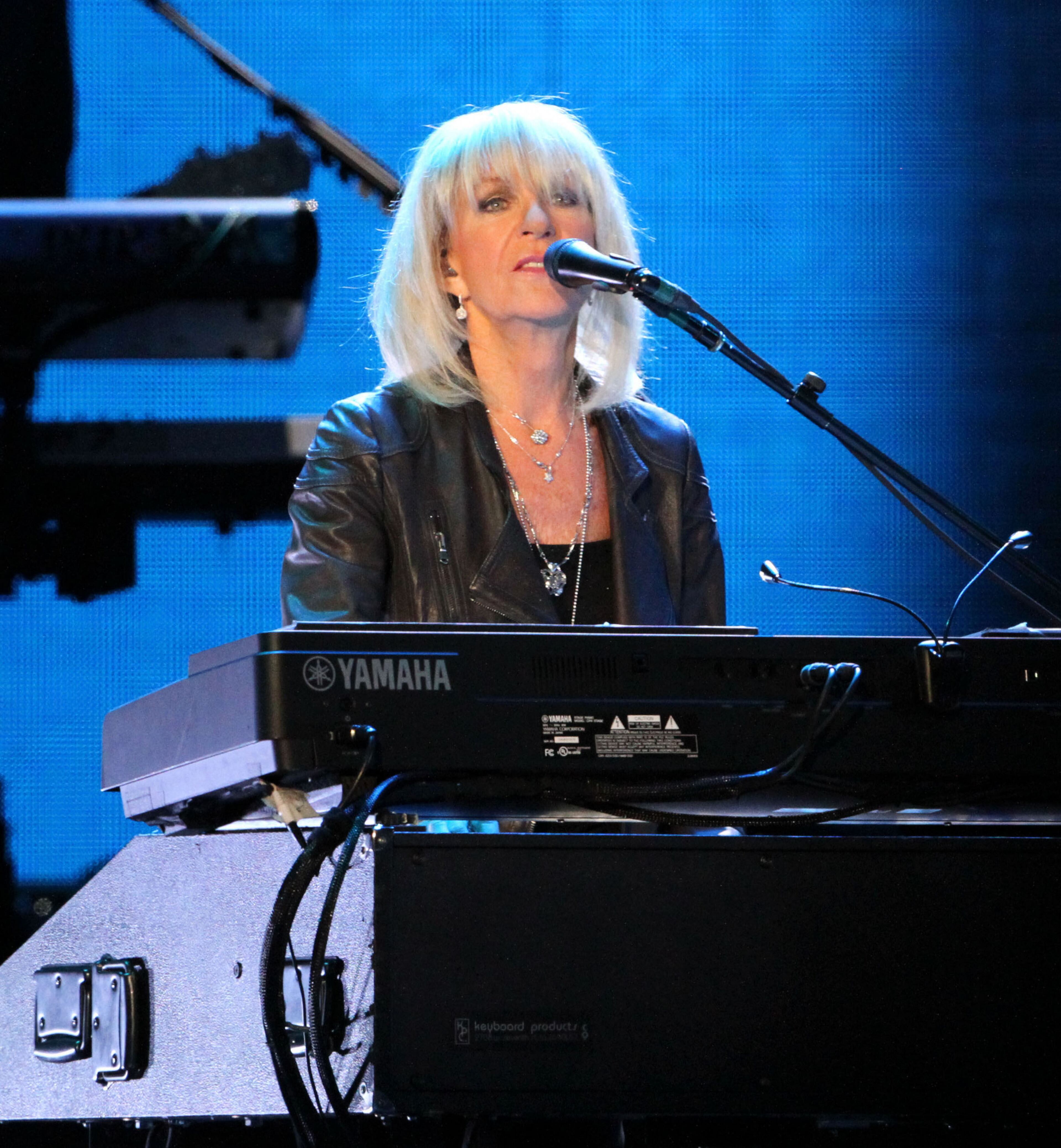 Christine McVie performs on "Dreams" during Fleetwood Mac's On With the Show tour stop at a sold-out Philips Arena in Atlanta Wednesday, Dec. 17, 2014. The tour marks the first time in 16 years that Stevie Nicks, Mick Fleetwood, Lindsey Buckingham and John McVie have toured with Christine McVie. Robb D. Cohen/RobbsPhotos.com