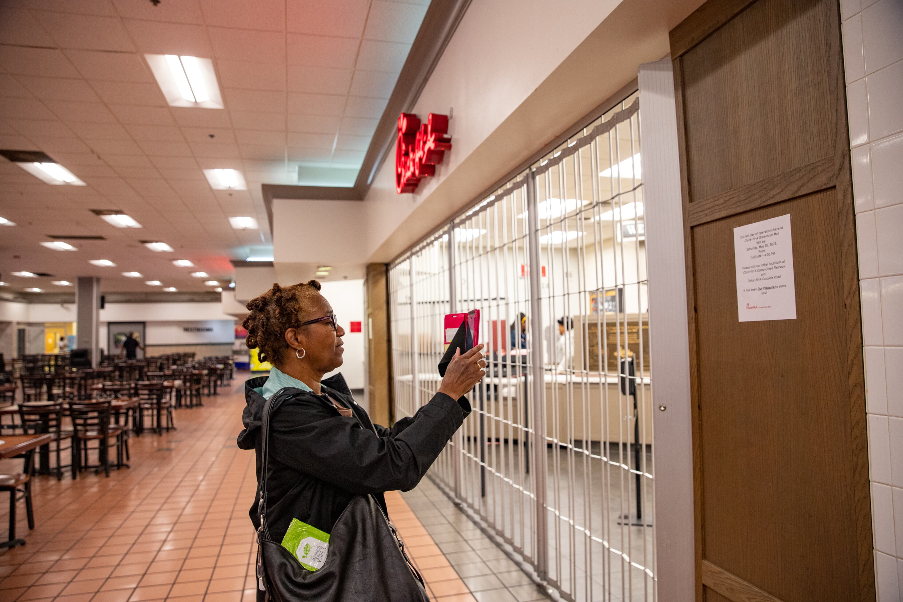 The first Chick-fil-A opened in 1967 in Greenbriar Mall and is now closing on Saturday, May 20, 2023. Patrons, including Vickie Henderson, came to buy one last chicken sandwich from the mall's food court and take photos of the iconic location. Several people remember middle school and friends gathering at the restaurant and some were at the establishment on the first day it opened. (Jenni Girtman for The Atlanta Journal-Constitution)