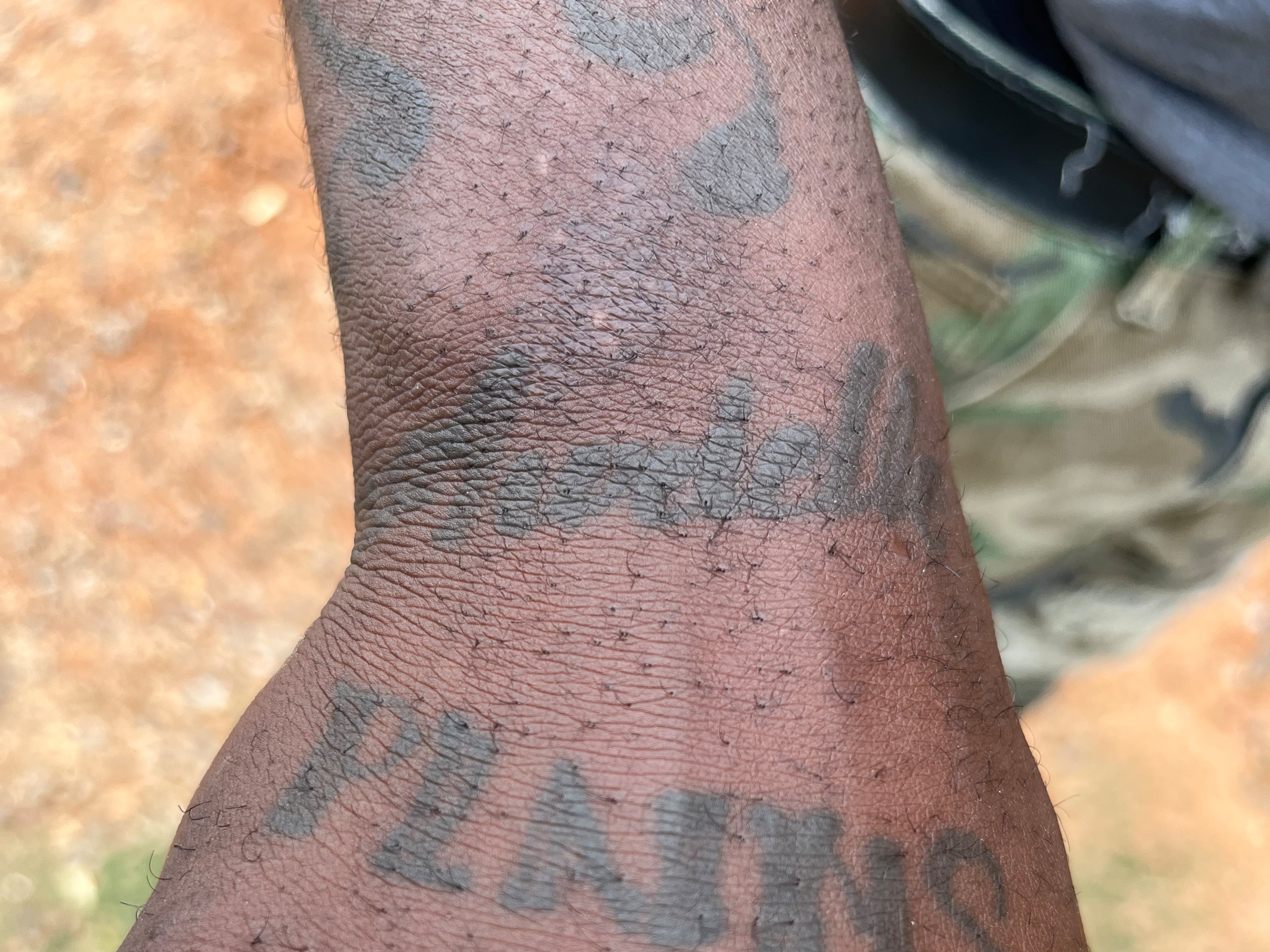 Montavius Bridges, on Feb. 24, 2023, shows a tattoo he has highlighting his hometown of Plains, where former U.S. president Jimmy Carter was from. Matt Kempner / AJC