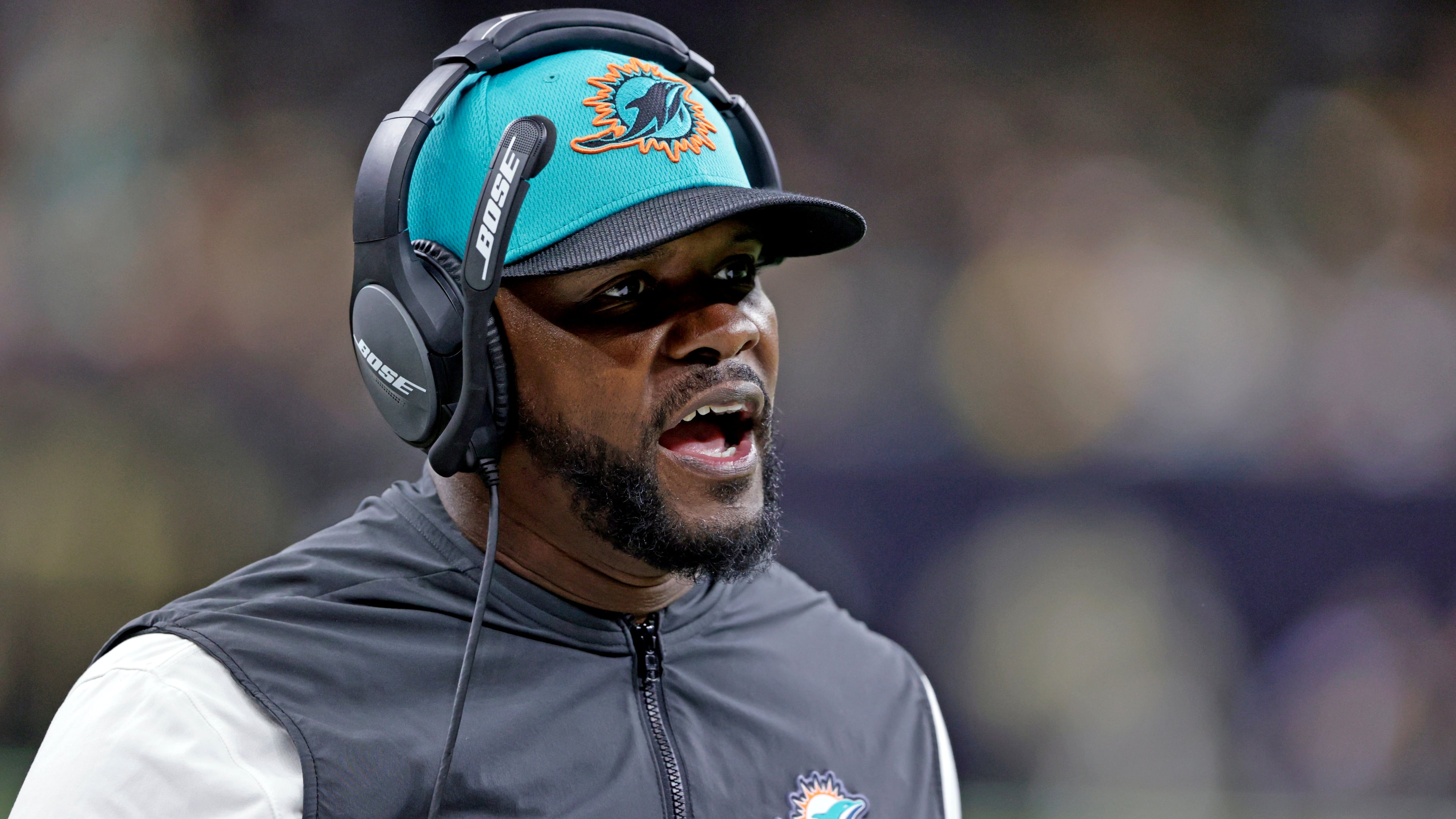 FILE - Miami Dolphins coach Brian Flores yells during the second half of an NFL football game against the New Orleans Saints Monday, Dec. 27, 2021, in New Orleans. (AP Photo/Butch Dill, File)