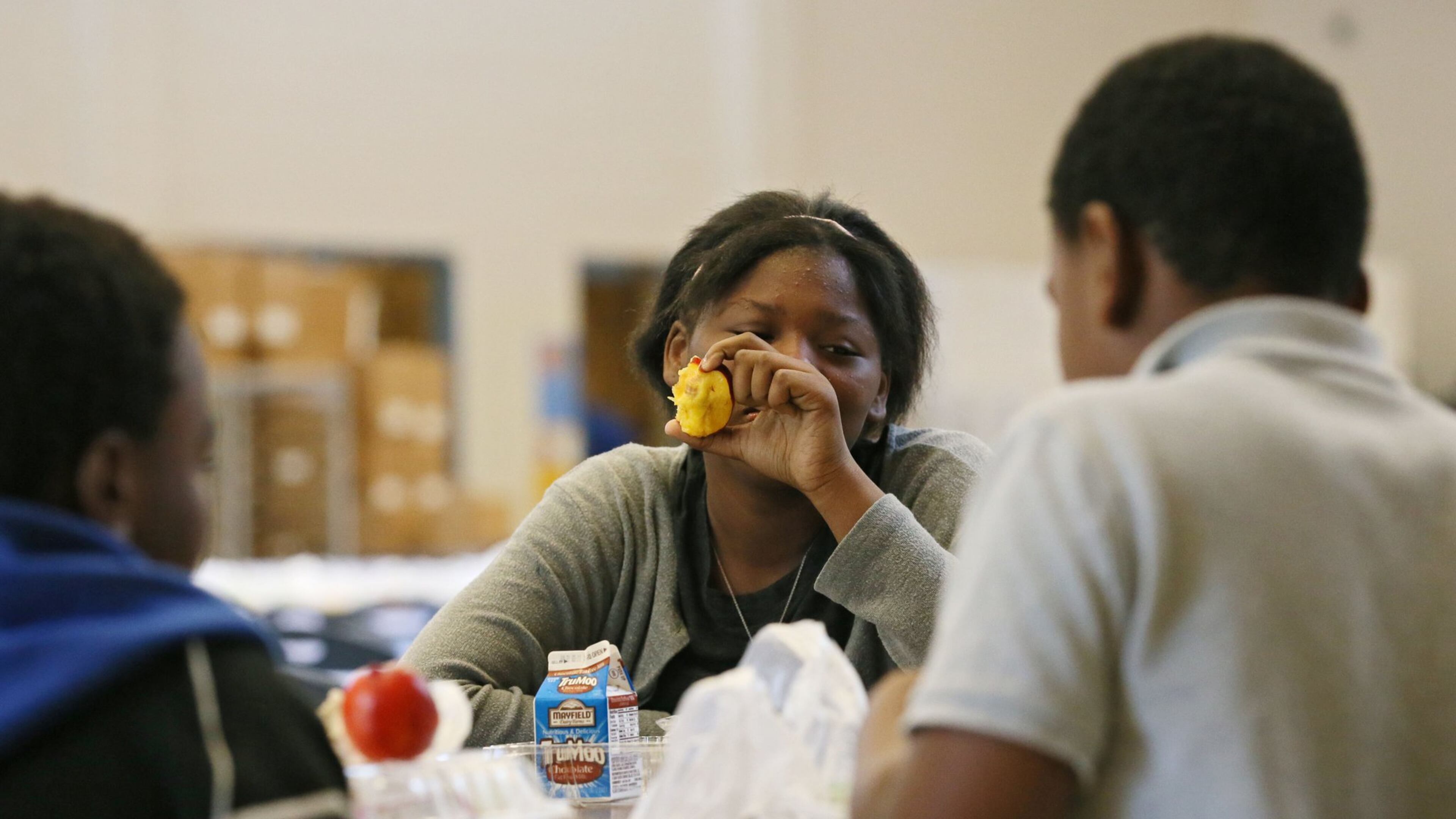 Summer-school students including eighth-grader Tatiana Hardy participate in the summer food program, in which Dekalb County employees prepare more than 4,000 lunches daily at Mary McLeod Bethune Middle School. BOB ANDRES / BANDRES@AJC.COM