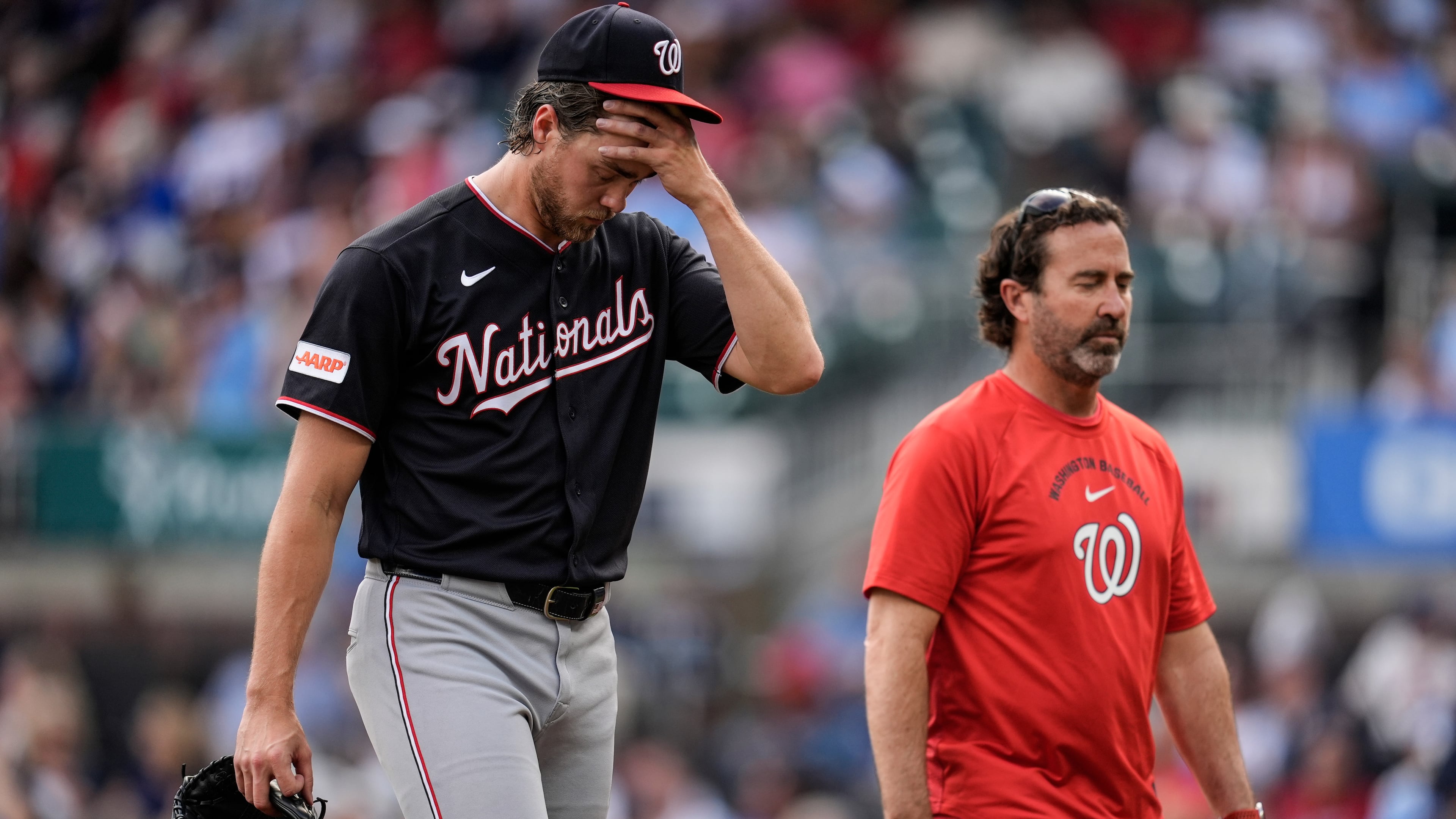 Washington Nationals pitcher Jake Irvin walks off the mound in the sixth inning of a baseball game against the Atlanta Braves, Saturday, May 23, 2026, in Atlanta. (AP Photo/Mike Stewart)