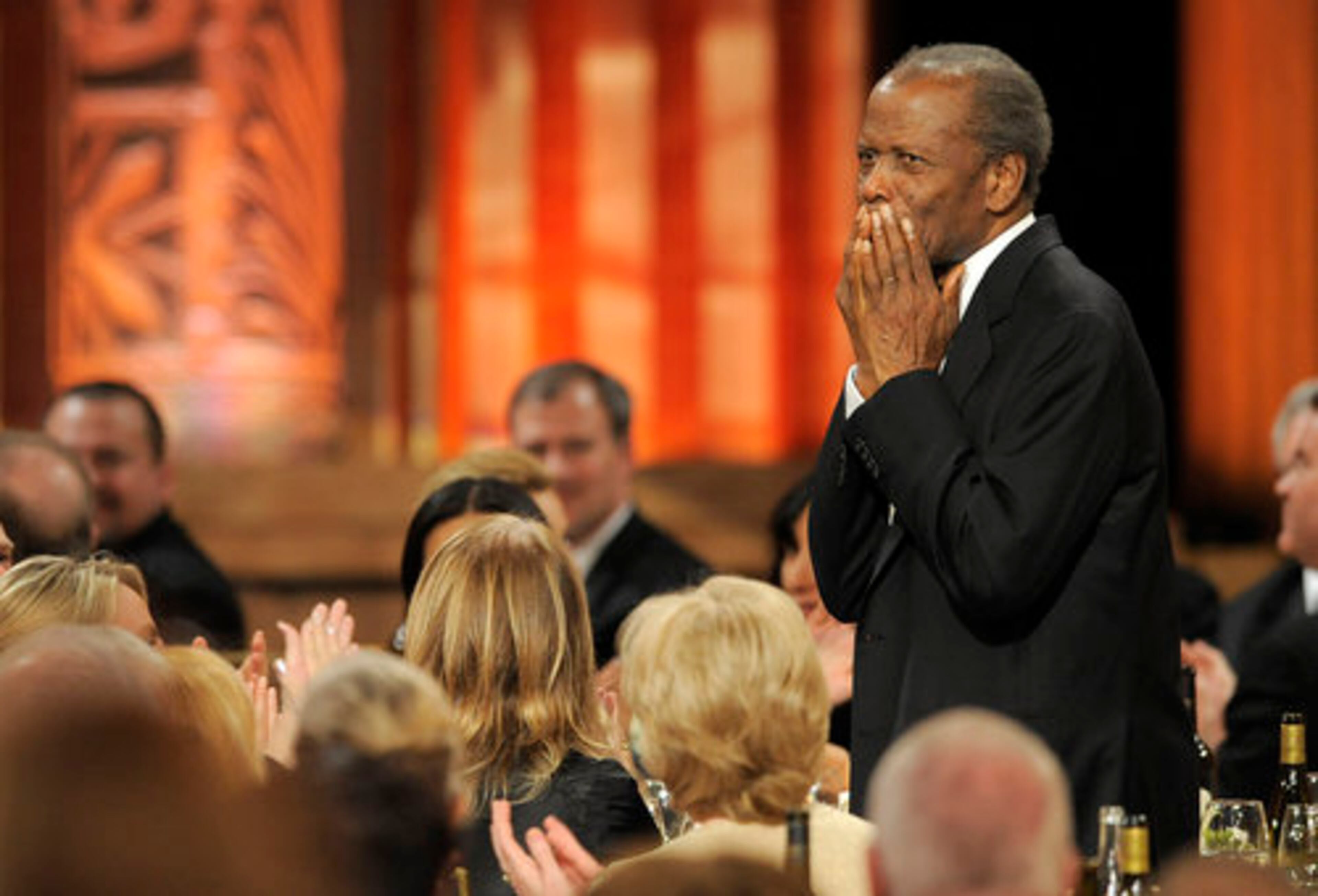 Actor Sidney Poitier sends his love to MacLaine.
