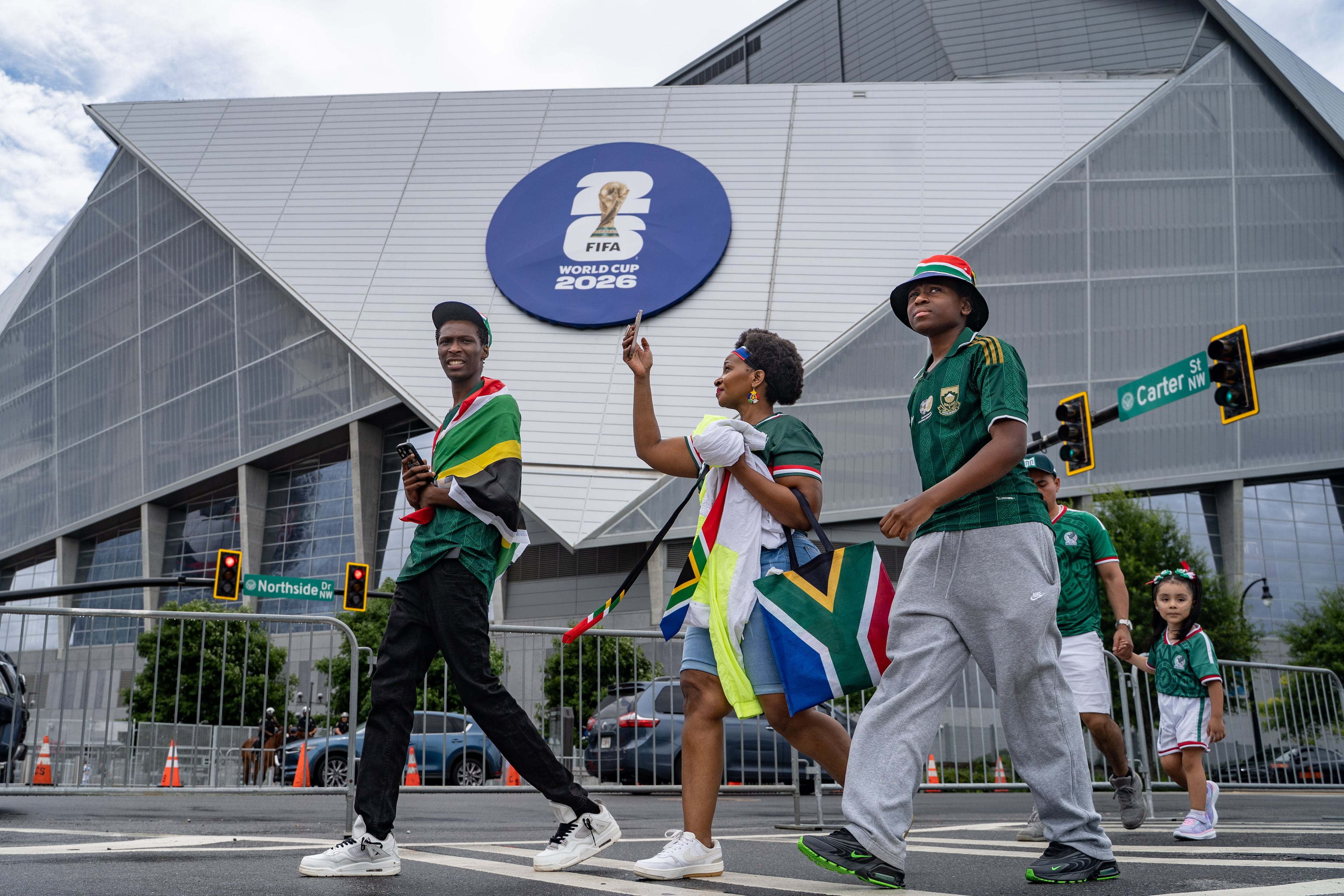 Soccer fans head to Mercedes-Benz Stadium for the South Africa verses Czechia match on Thursday, June 18, 2026. (Ben Hendren for the AJC)