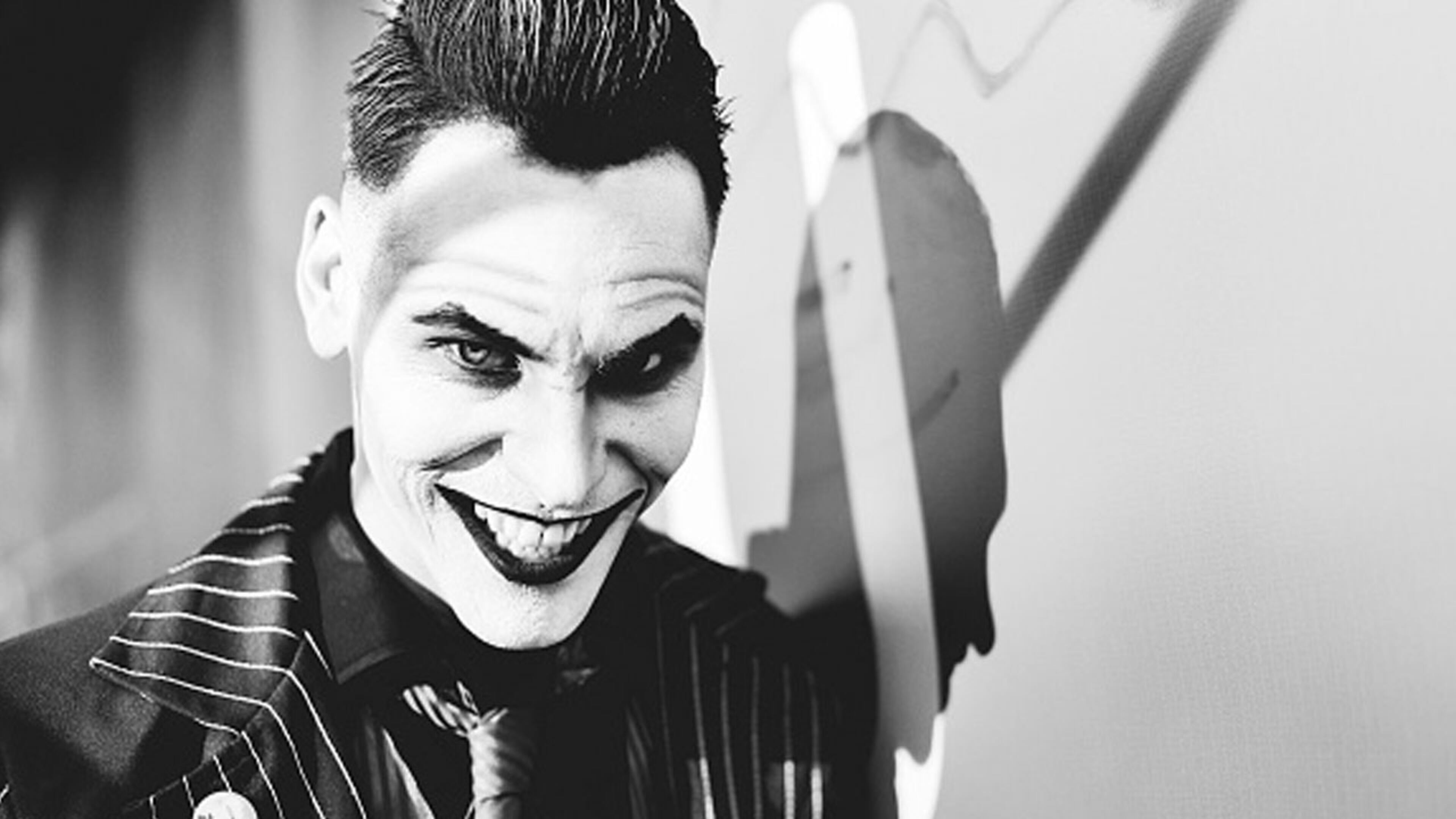 SAN DIEGO, CALIFORNIA - JULY 18: (EDITORS NOTE: Image has been edited using digital filters) A cosplayer dressed as The Joker attends the 2019 Comic-Con International on July 18, 2019 in San Diego, California. (Photo by Matt Winkelmeyer/Getty Images)