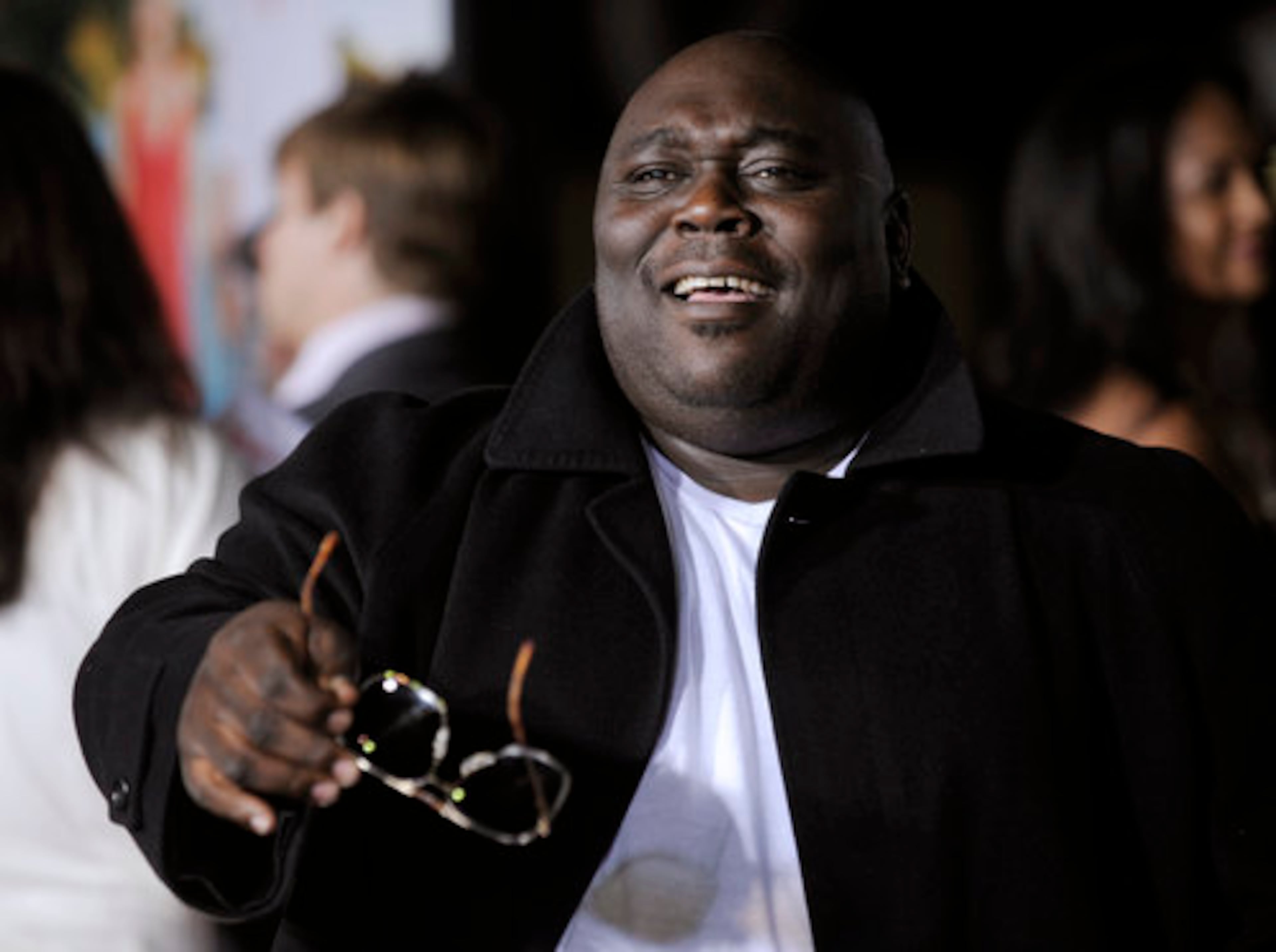 Faizon Love, a cast member in "Couples Retreat," banters with photographers at the premiere. (AP File)