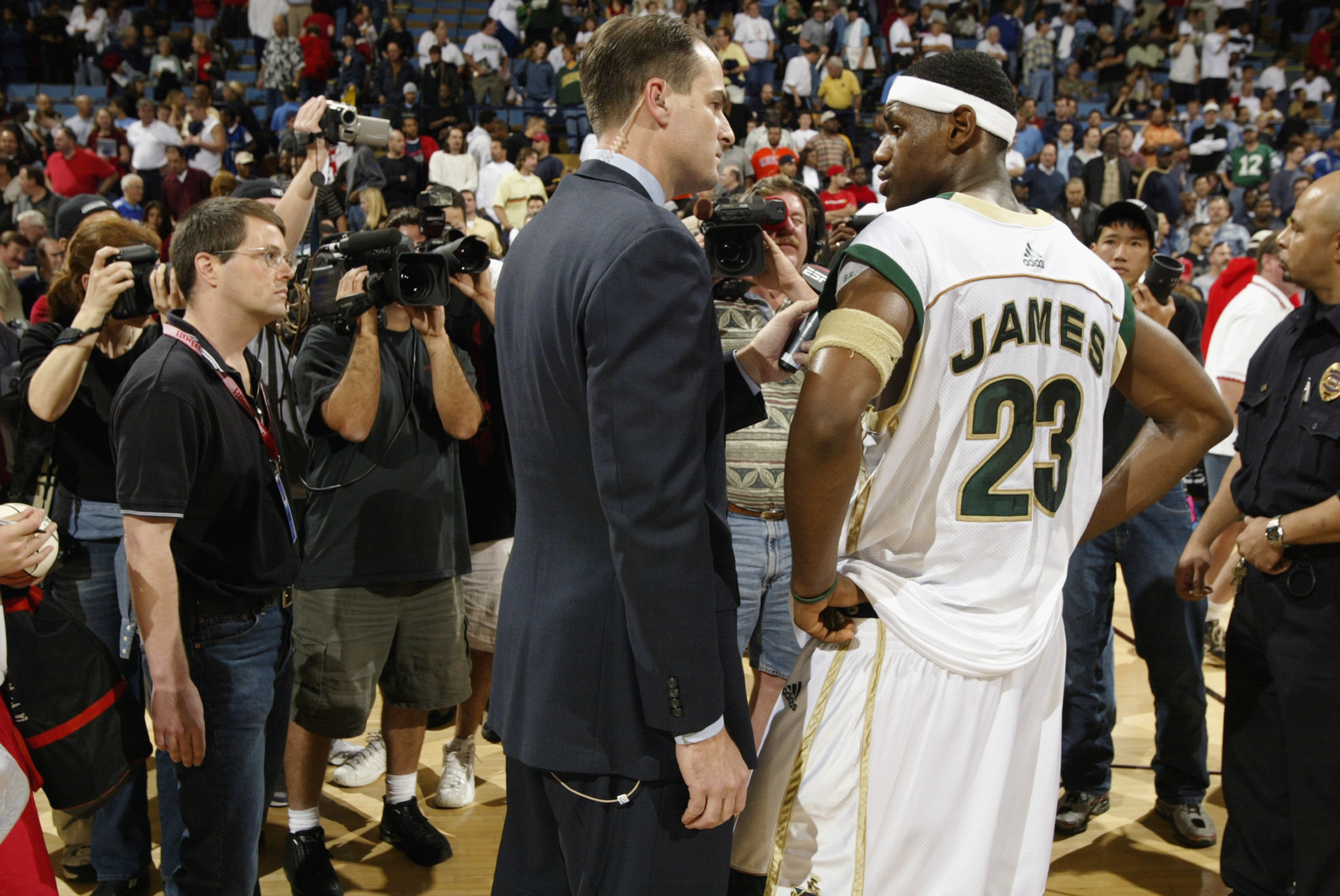 LeBron James #23 of St. Vincent-St. Mary's High School speaks to reporters following his game against Mater Dei High School during the Ninth Annual Pangos Dream Classic game at UCLA's Pauley Pavilion on January 4, 2003 in Los Angeles, California. (Photo by Stephen Dunn/Getty Images)